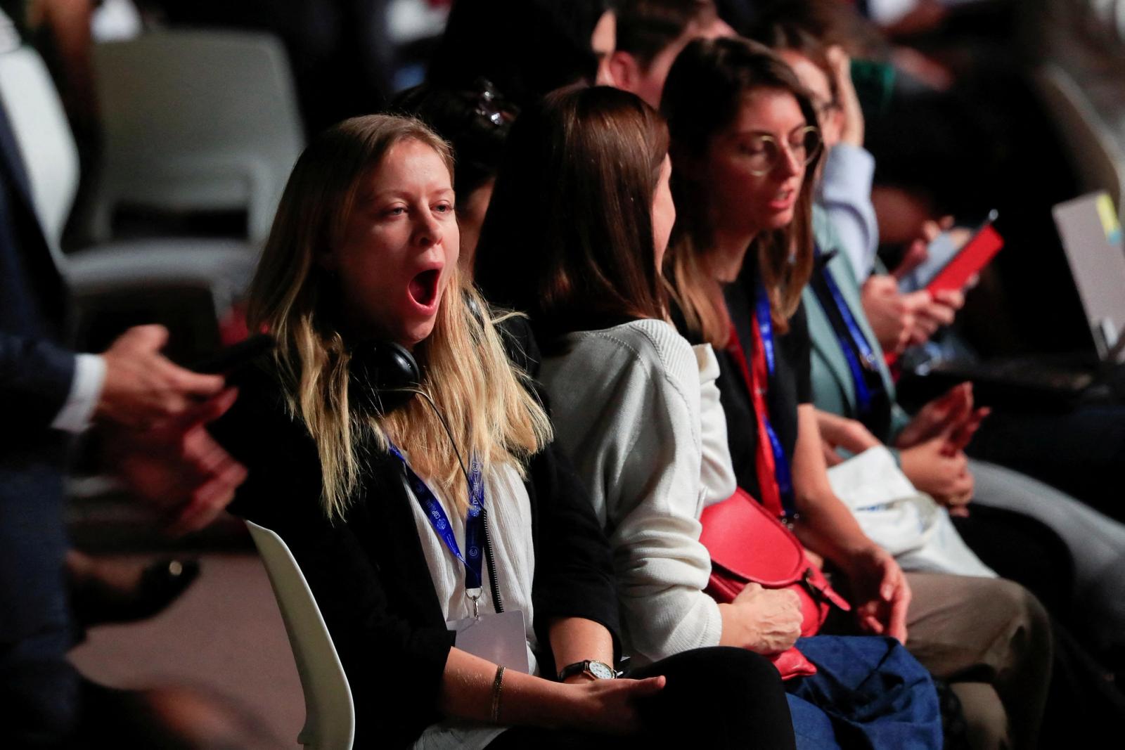 A delegate yawns at the United Nations Climate Change Conference.