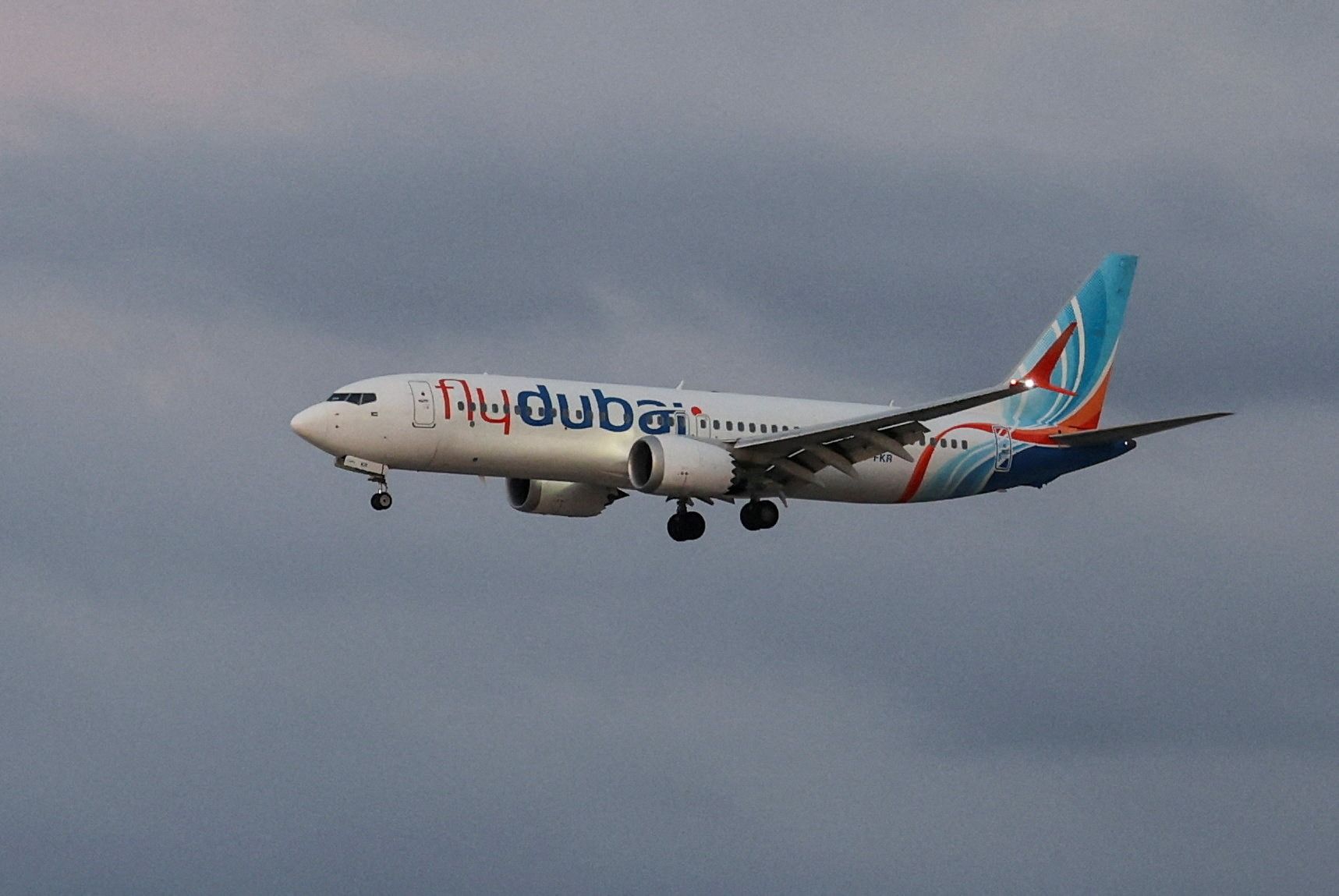 A FlyDubai airplane in the air.