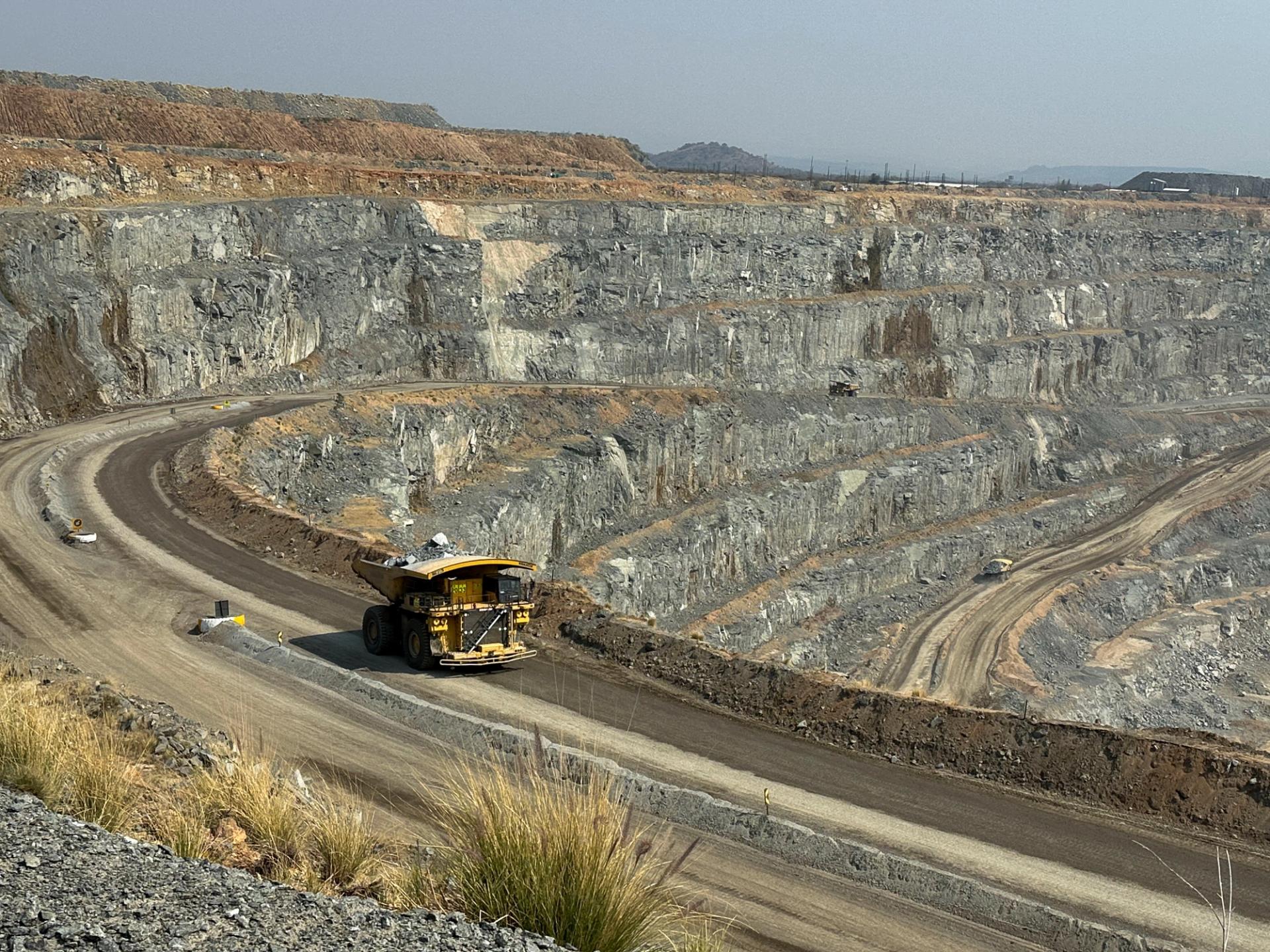 A truck transports blasted ore at the Mogalakwena open-pit platinum mine in South Africa. 