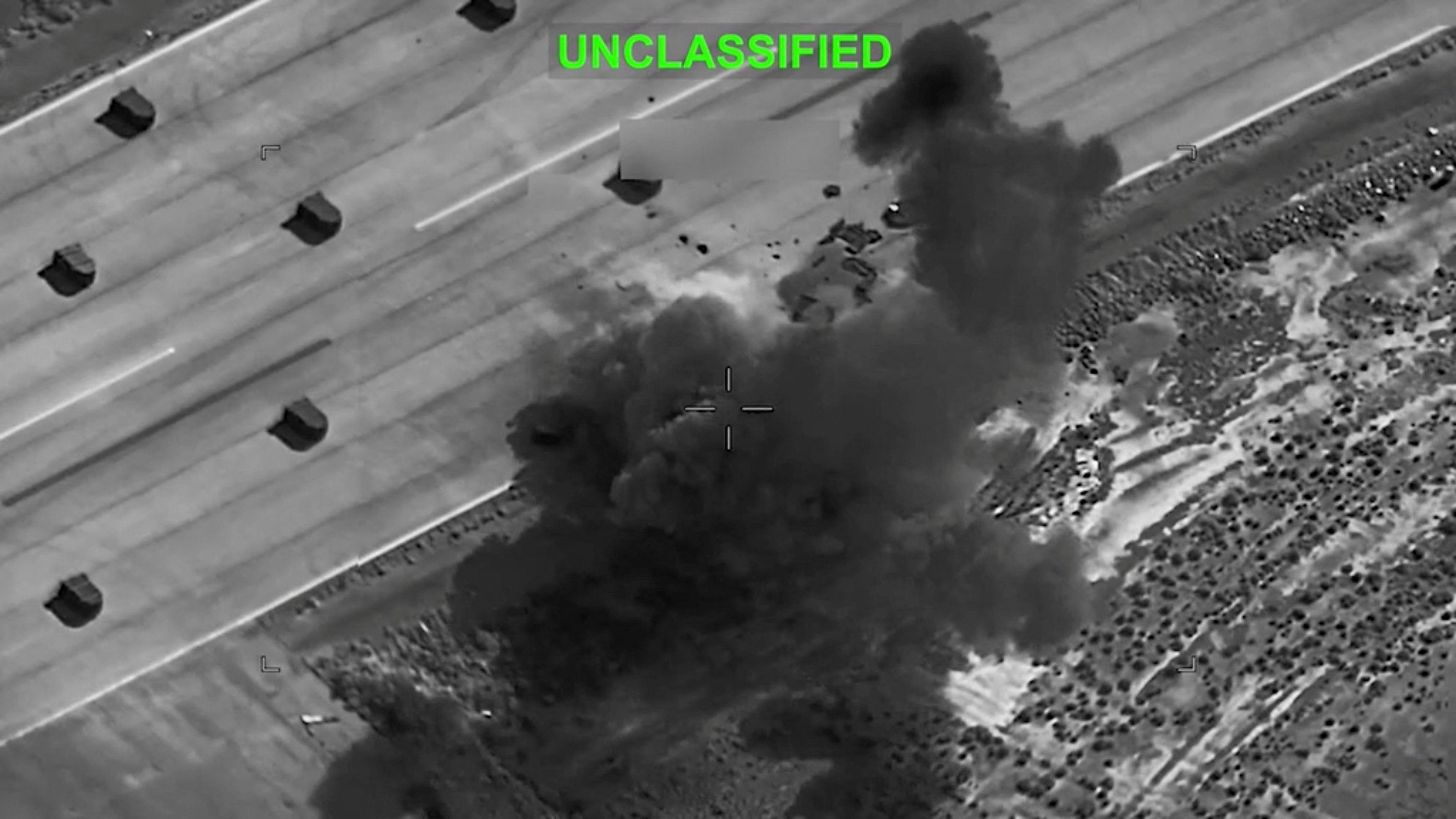 Smoke rises from explosions at an unknown location, following what US Central Command (CENTCOM) said were strikes on Iranian military targets.