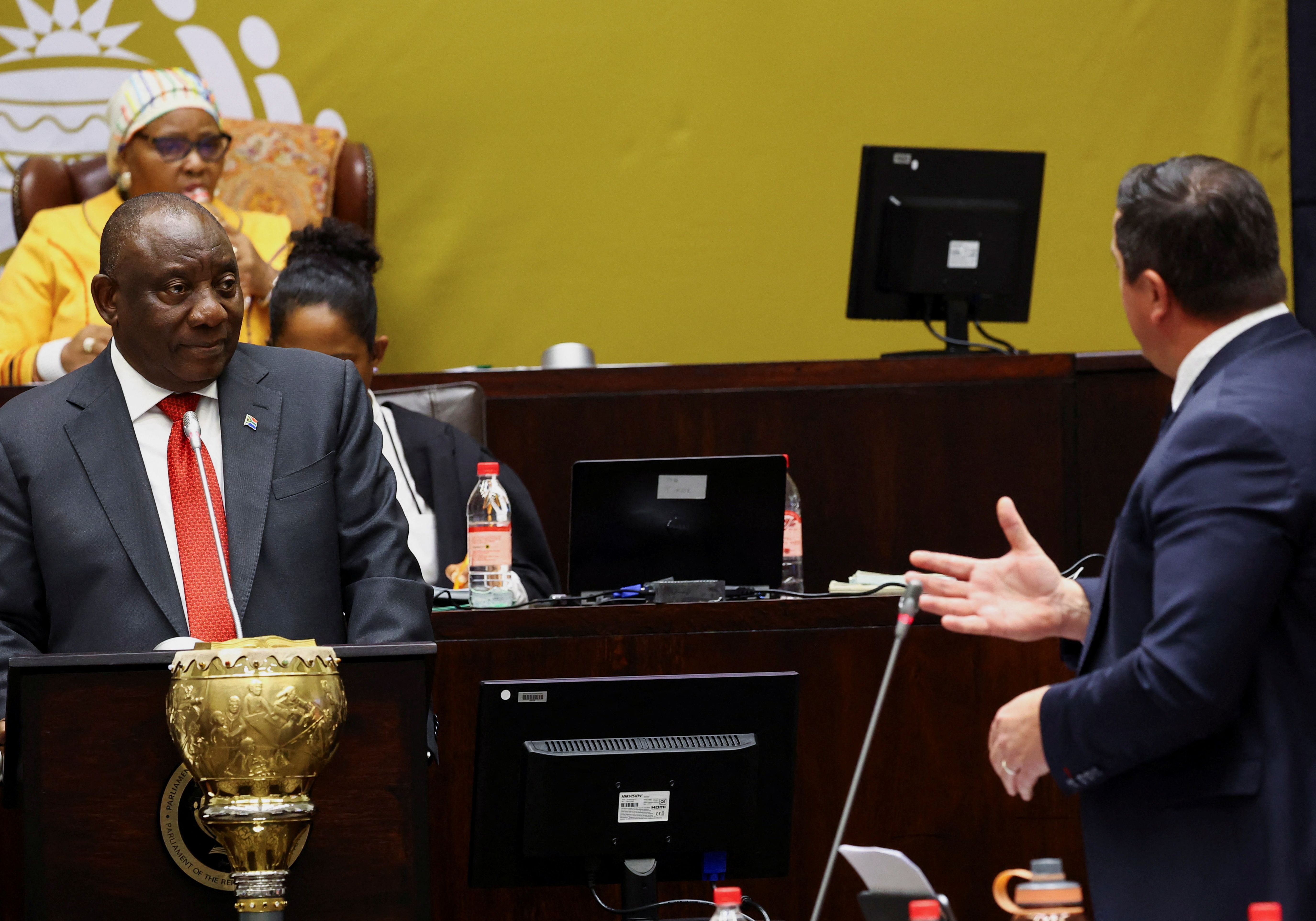 President Cyril Ramaphosa (left) and Democratic Alliance leader John Steenhuisen