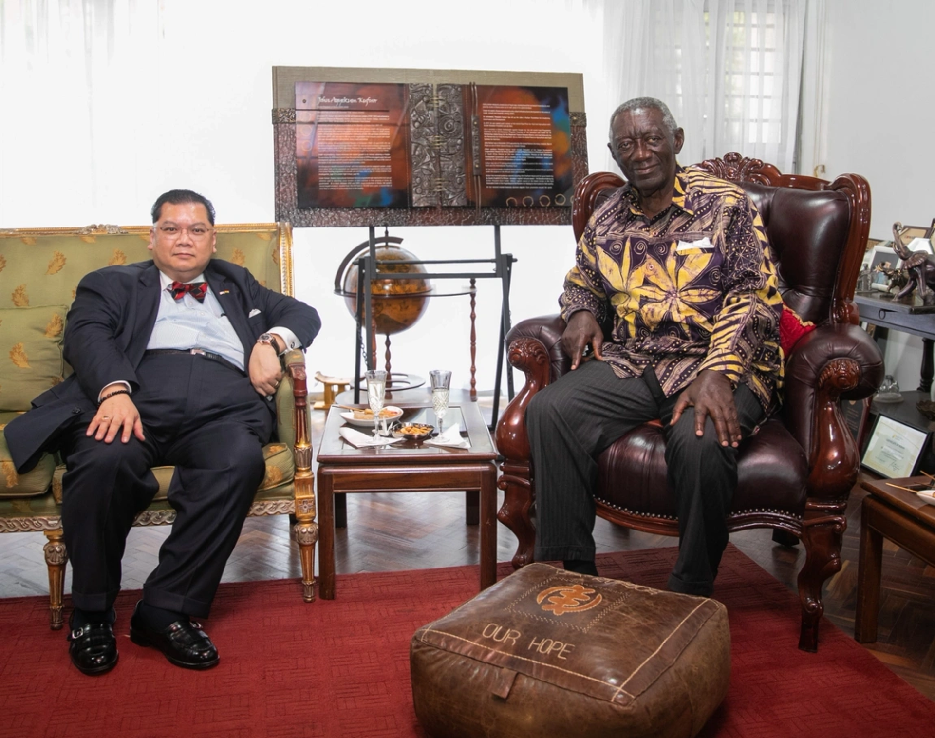 Former US Special Envoy for the Sahel Region J. Peter Pham meets former Ghana President John Kufuor in Accra in 2021.