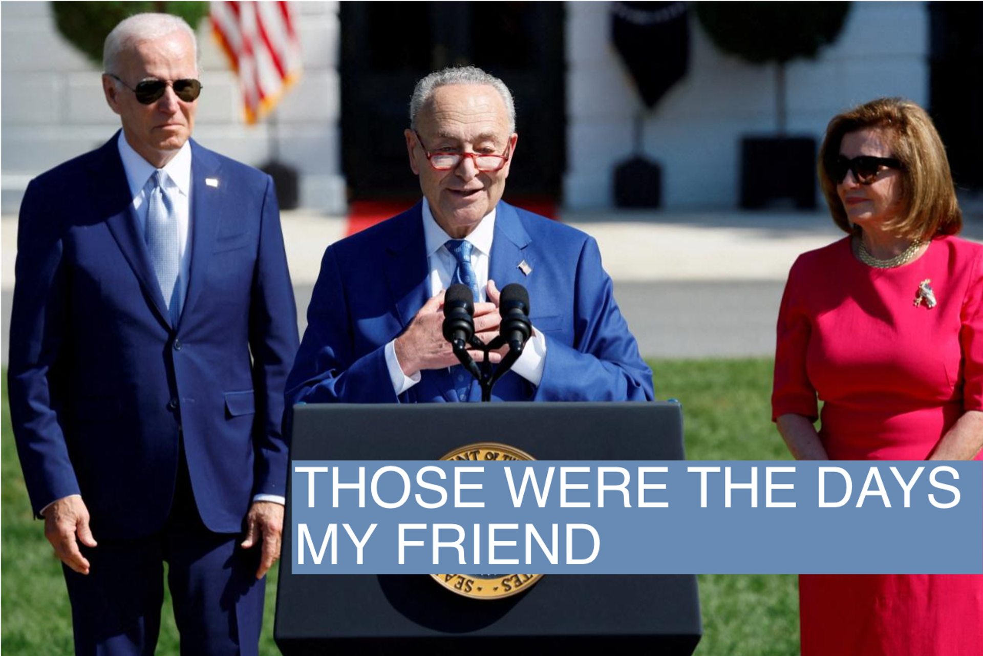 U.S. Senate Majority Leader Chuck Schumer (D-NY) speaks as U.S. President Joe Biden looks on during an event to sign the CHIPS and Science Act in Washington, DC. August 9, 2022