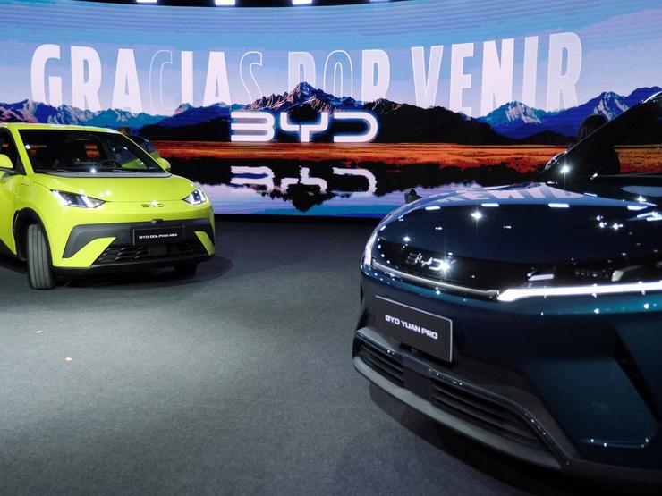 A BYD Dolphin Mini electric vehicle and a Yuan Pro are displayed during the launch event of Chinese electric vehicle (EV) maker BYD in Buenos Aires, Argentina.
