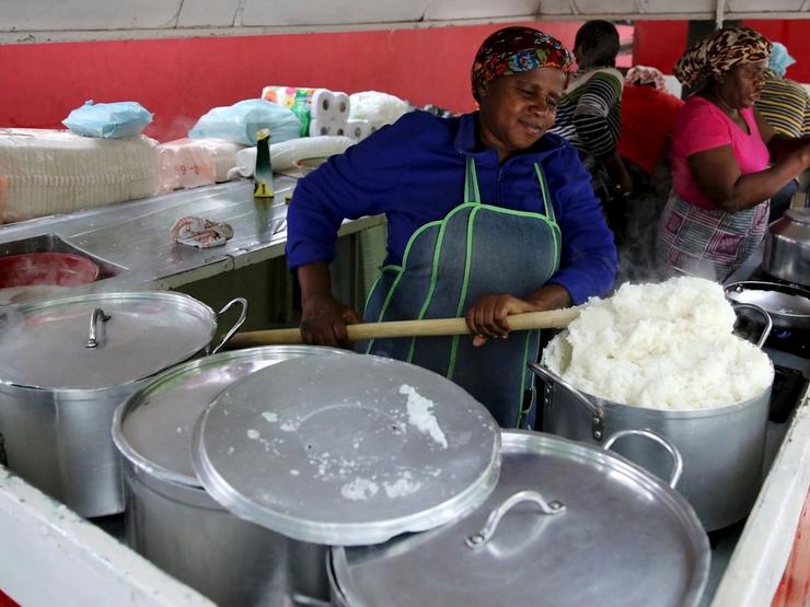 Lindi Sehlabela prepares “pap”, a traditional porridge made from mielie-meal, in Sandton.