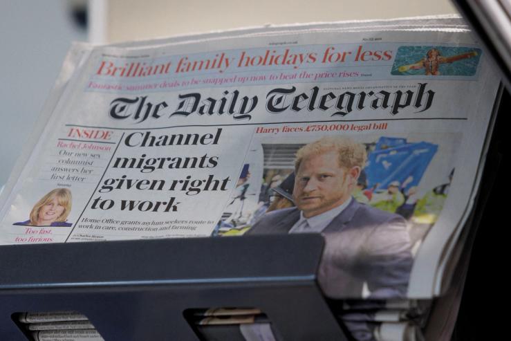 Copies of The Daily Telegraph.