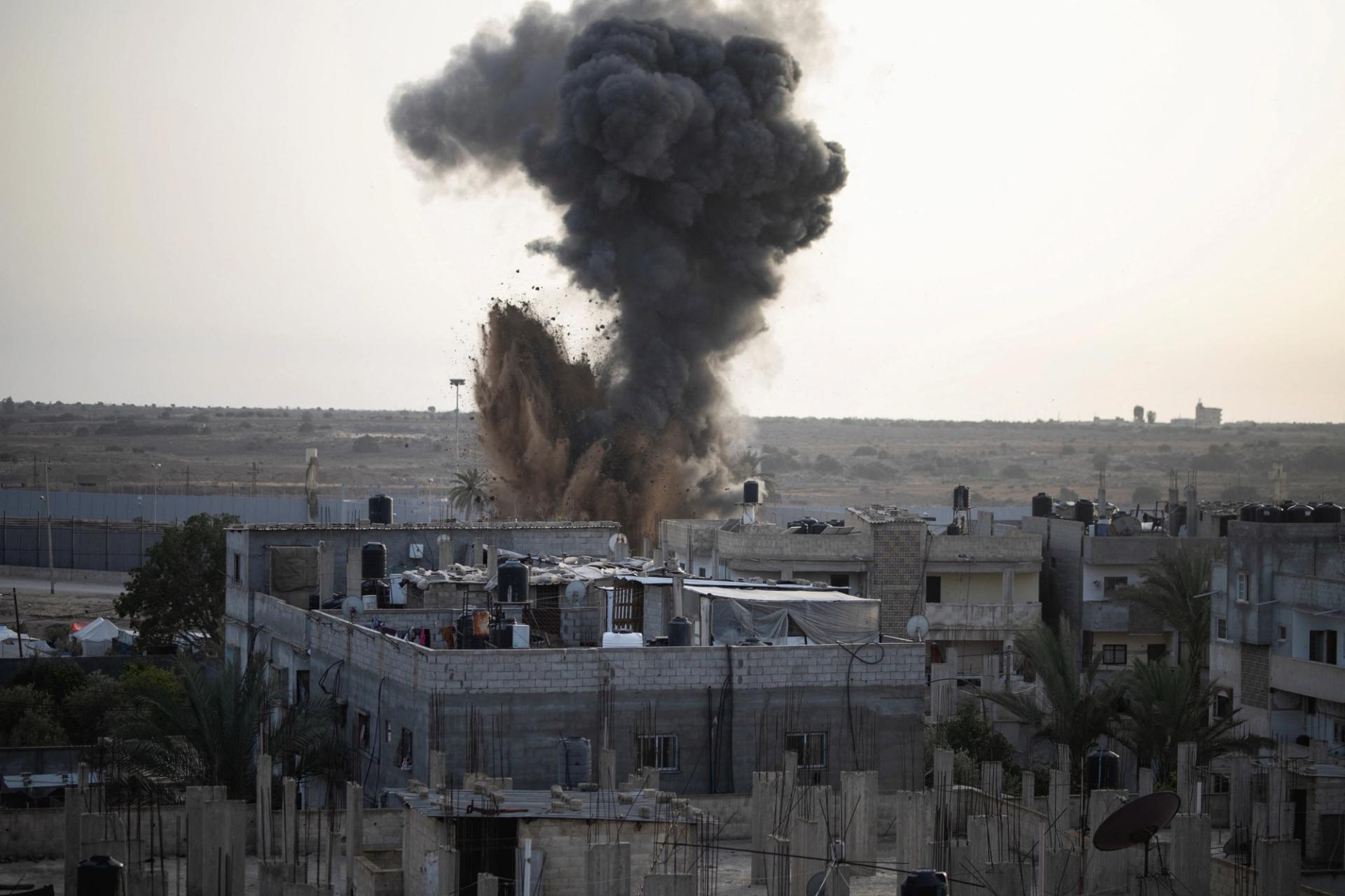 Smoke rises following Israeli strikes in Rafah on April 22.