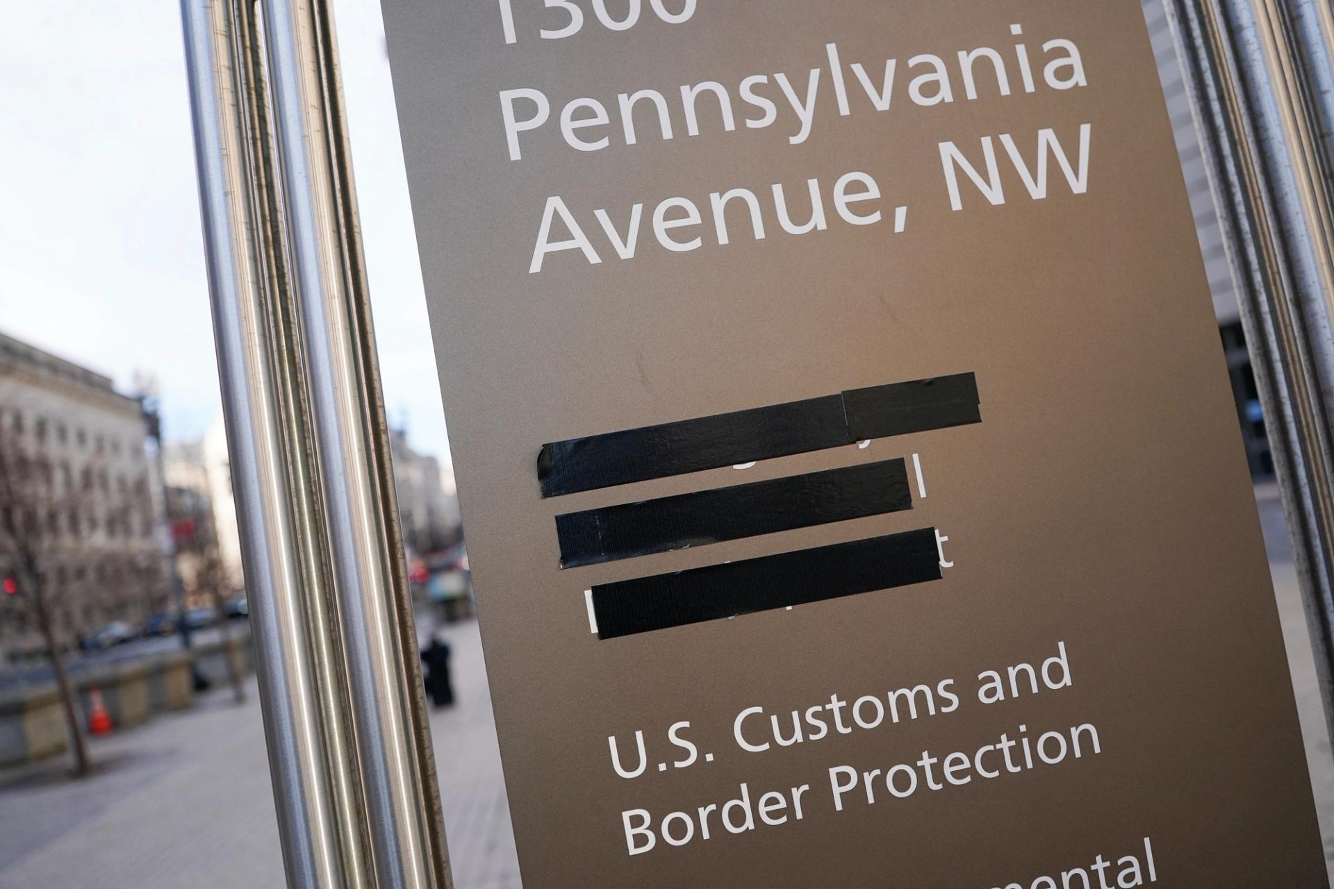 USAID signage is covered by black tape, at the agency’s headquarters in Washington.