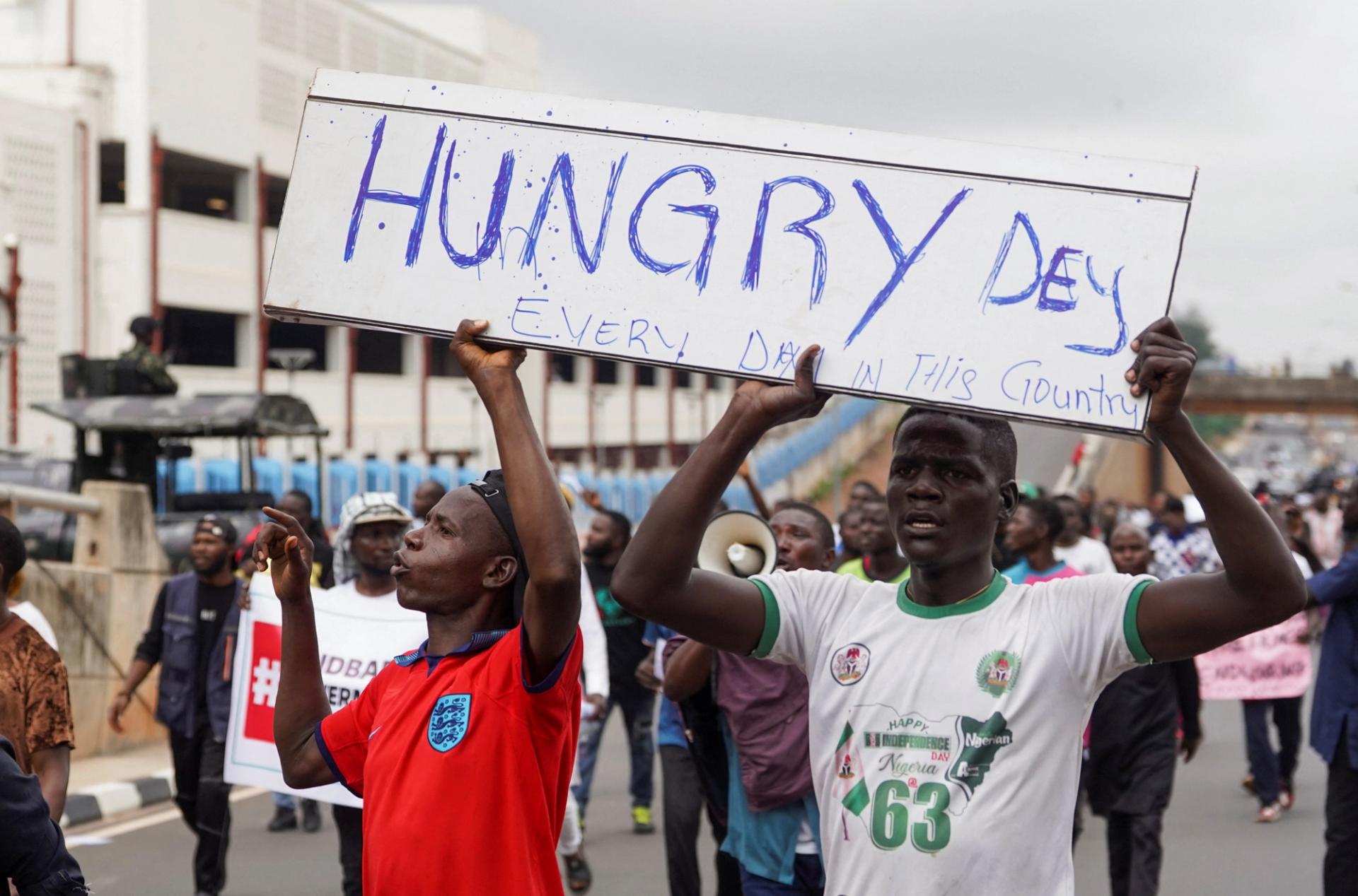 Demonstrators hold a placard, during an anti-government demonstration to protest against bad governance and economic hardship in Abuja, Nigeria August 1, 2024. REUTERS/Marvellous Durowaiye