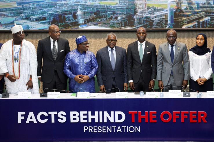 Ooni of Ife Oba Adeyeye Enitan Ogunwusi; Chairman, Access Holdings Plc and Coronation Group, Aigboje Aig-Imoukhuede, Group Chairman, Nigerian Exchange Group, Umaru Kwairanga, President/Chief Executive Officer, Dangote Group, Aliko Dangote, Managing Director/Chief Executive Officer of Nigerian Exchange Group, Temi Popoola, Lagos State Governor Babajide Sanwo-Olu, and Group Executive Director at Dangote Industries Fatima Aliko-Dangote, at the opening day of Dangote Refinery’s IPO at the Nigerian Exchange Group in Lagos, Nigeria, Sept. 14, 2026