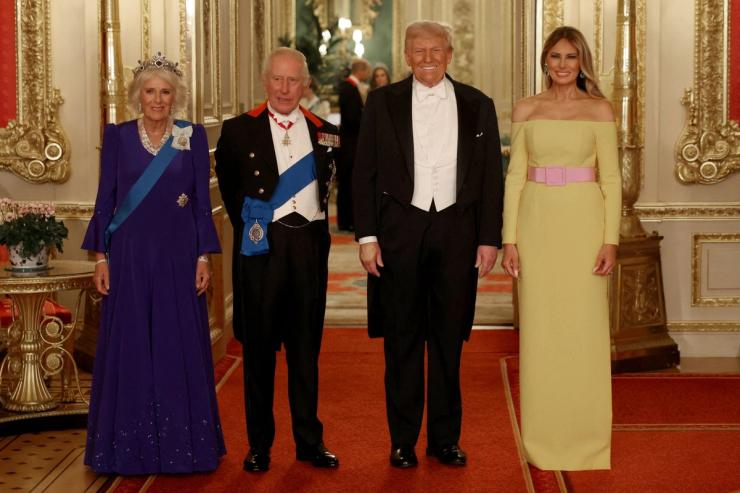 Britain’s Queen Camilla, King Charles, U.S. President Donald Trump and first lady Melania Trump pose for a family photo at the State Banquet.