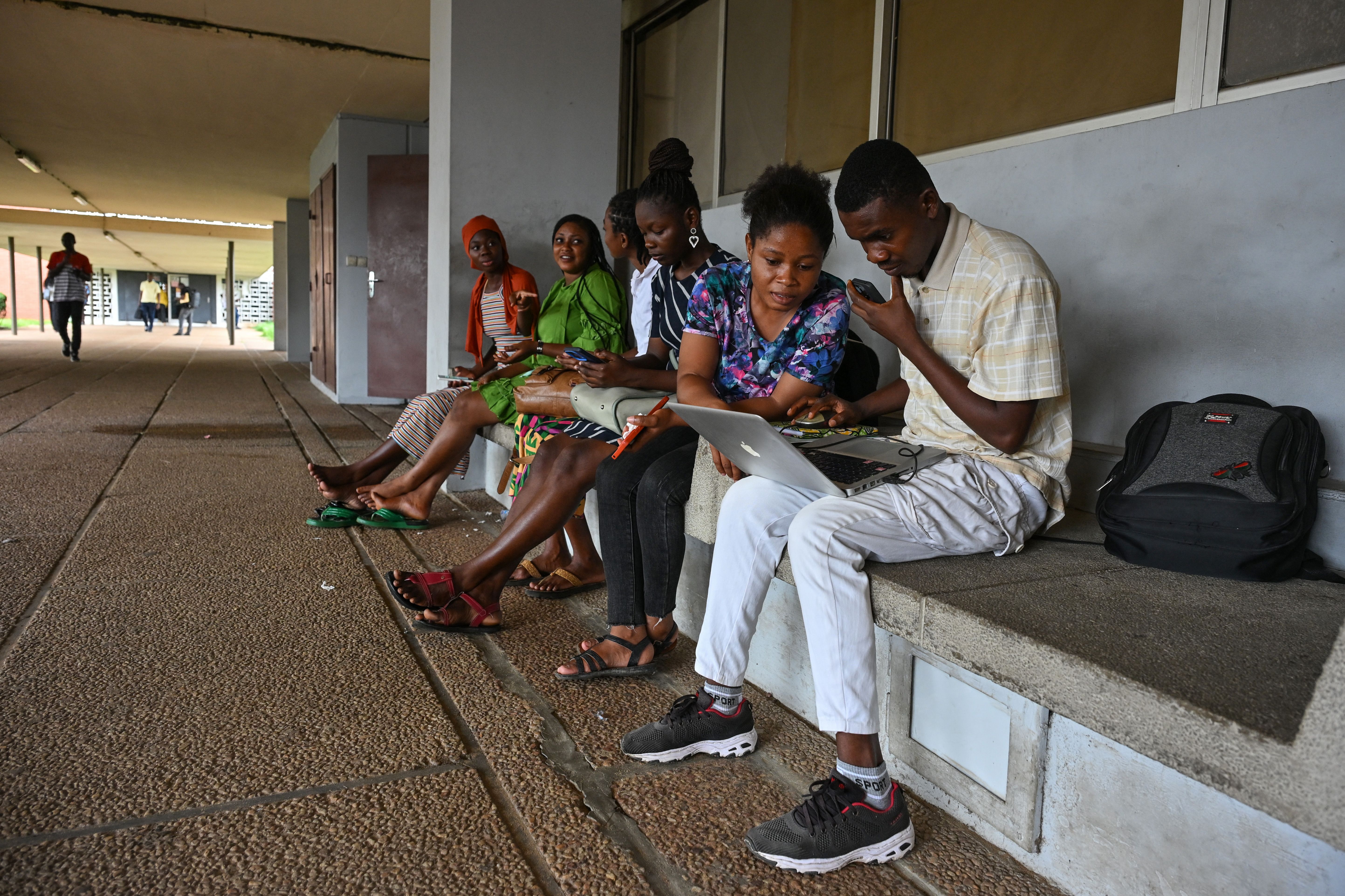 Students attend Felix Houphouet-Boigny University in Abidjan on June 10, 2025.