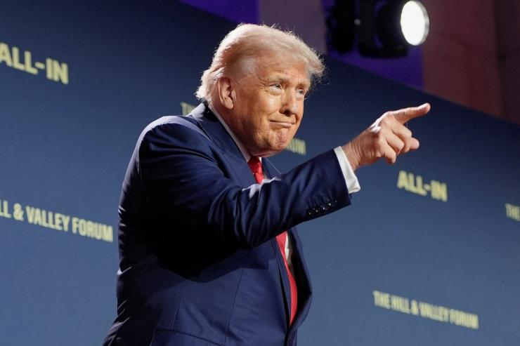 President Donald Trump gestures during the “Winning the AI Race” Summit in Washington.