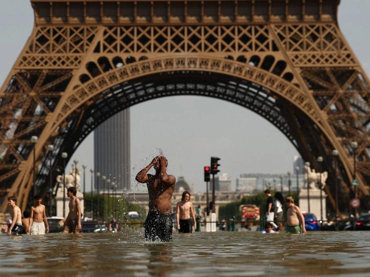 A man bathes in the Trocadero Fountain in Paris