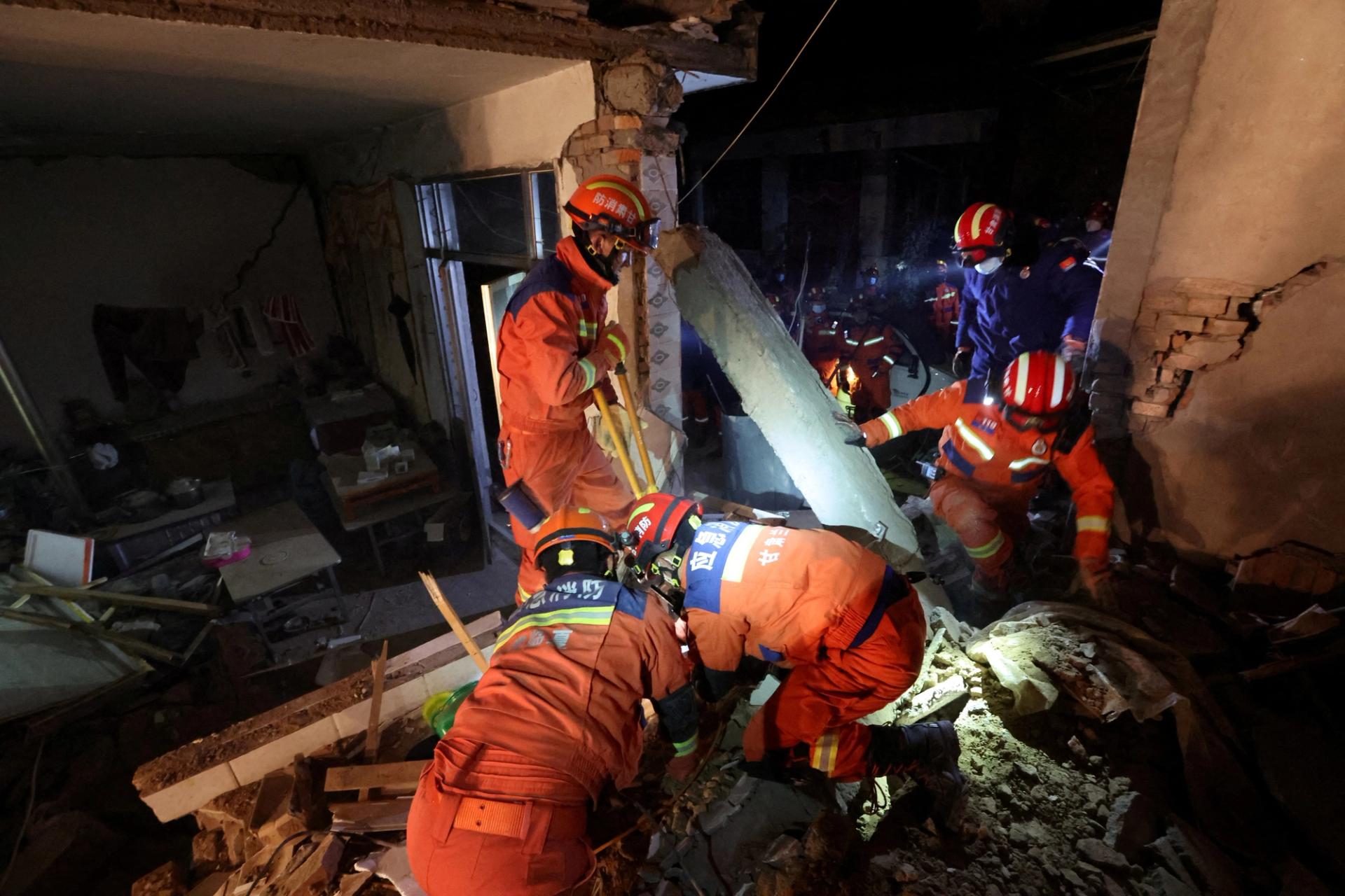 Rescue workers conduct search and rescue operations at Kangdiao village following the earthquake in Jishishan county, Gansu province, China December 19, 2023. 