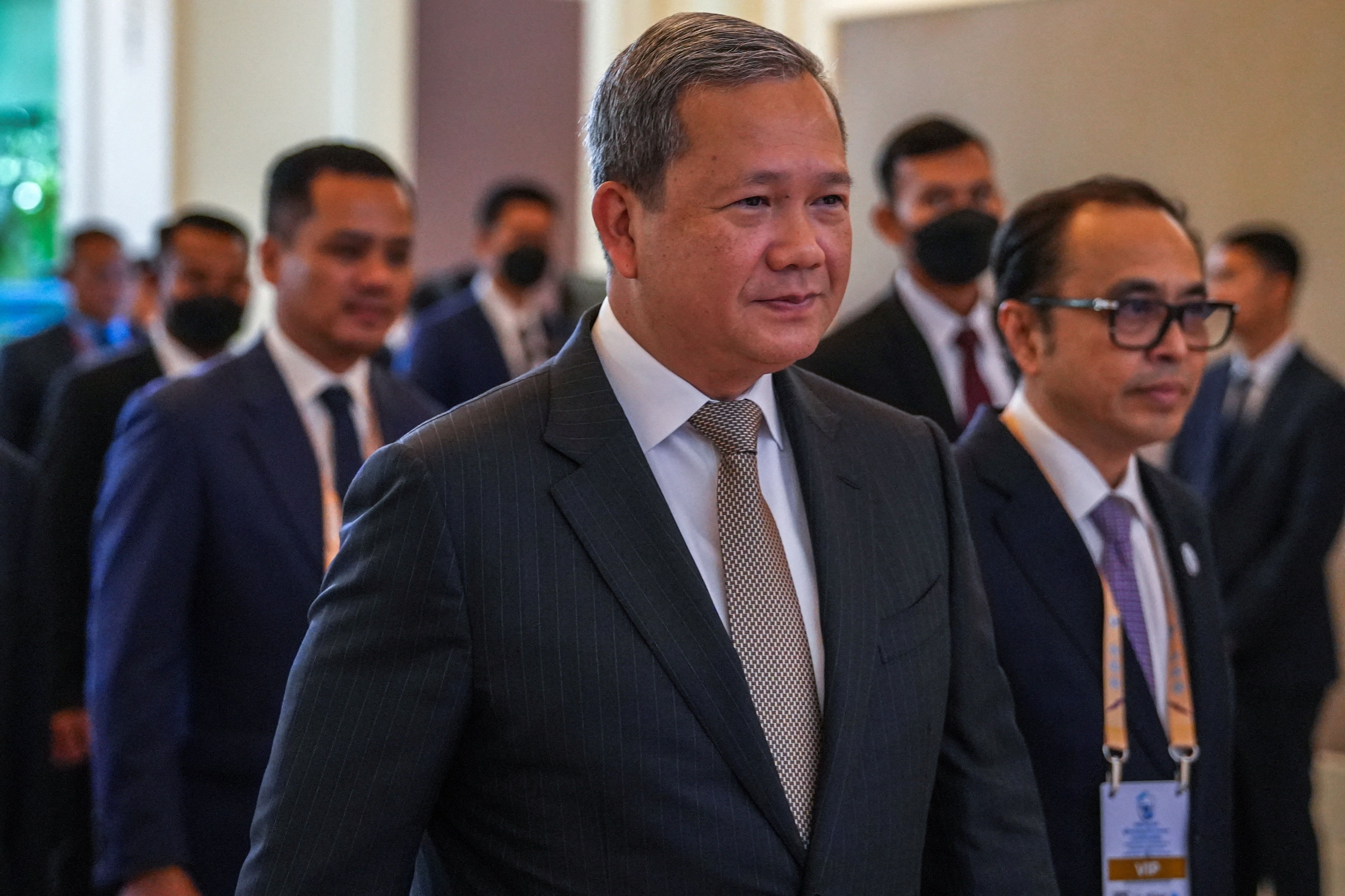 Cambodia’s Prime Minister Hun Manet arrives ahead of the opening an international conference on combating online scams in Phnom Penh, Cambodia