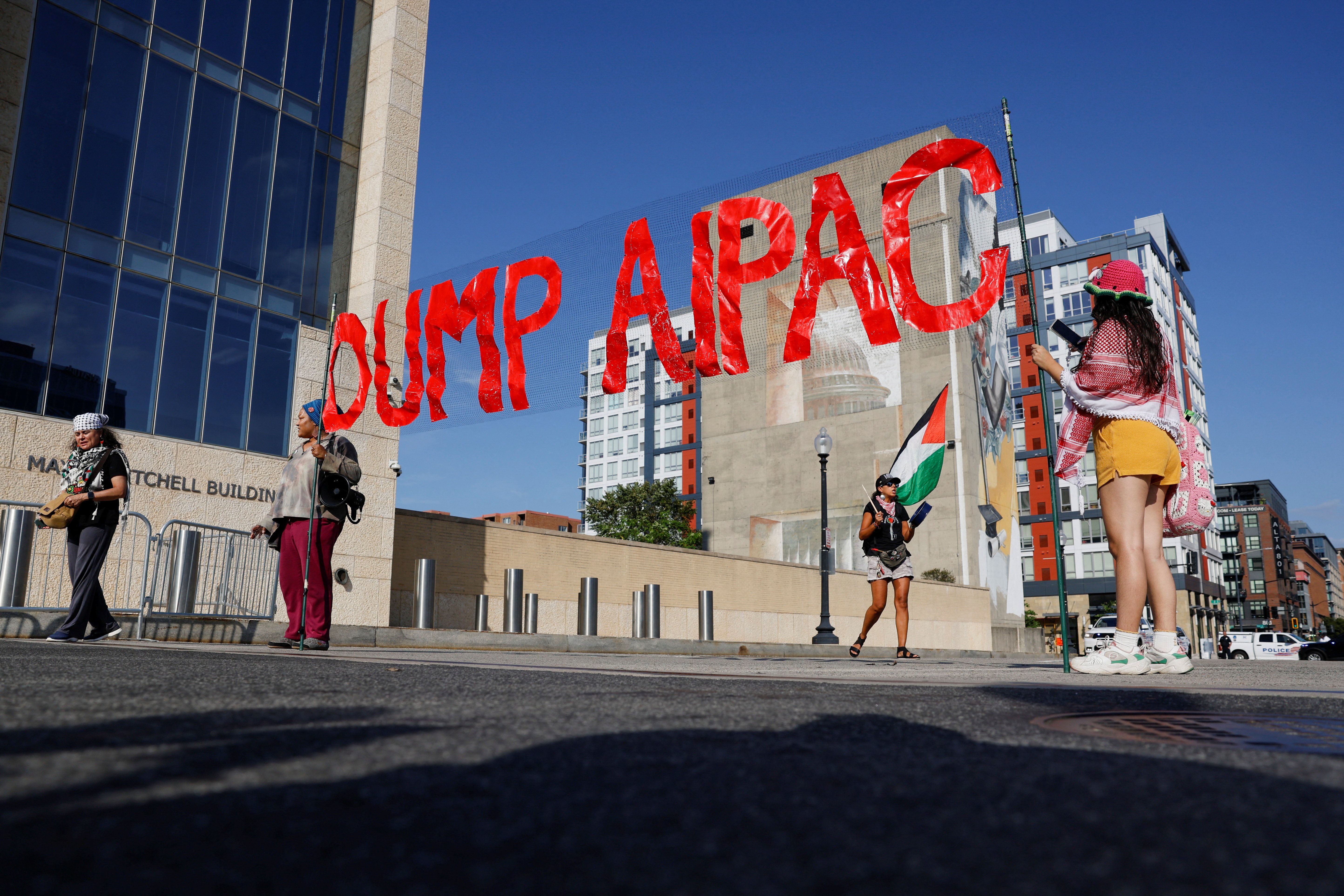 Protesters demonstrate in front of AIPAC’s office in Washington. 