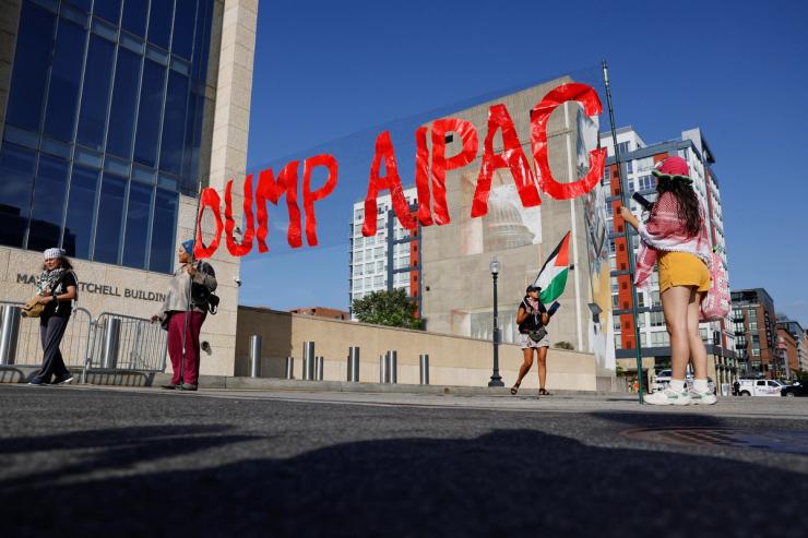 Protesters demonstrate in front of AIPAC’s office in Washington.