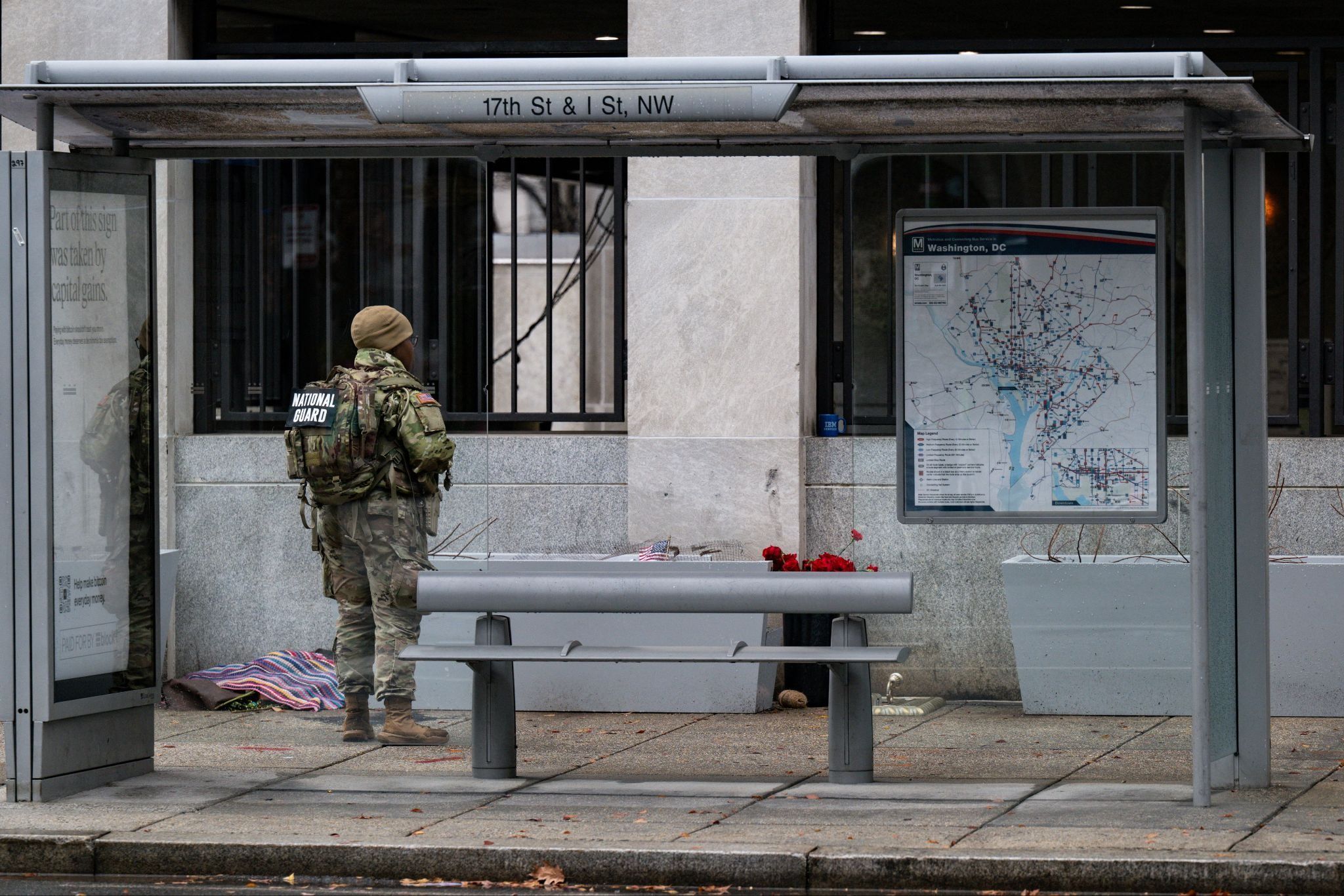 A National Guard troop patrols near the shooting site