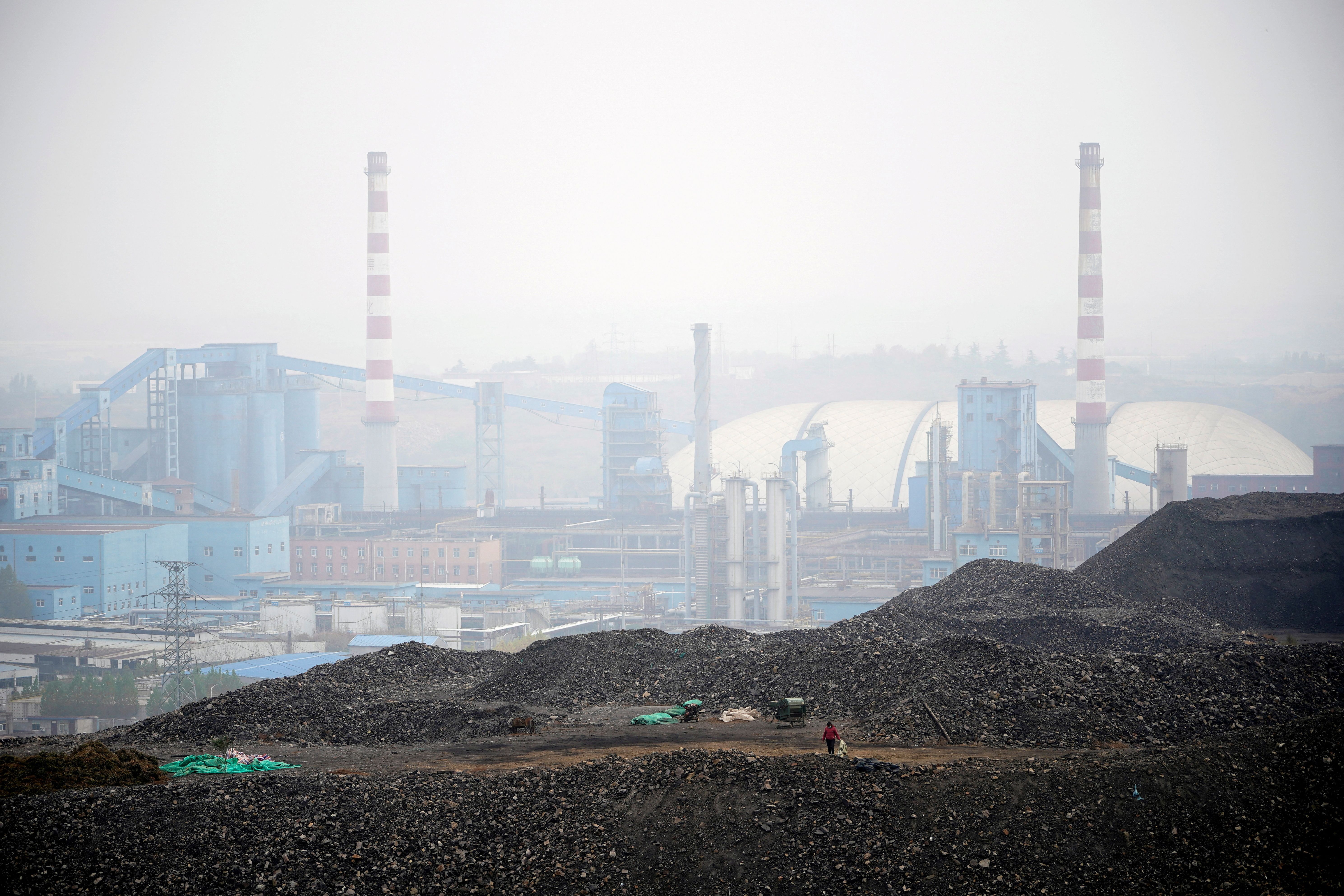 Dunes of low-grade coal are seen near a coal mine in Ruzhou. 
