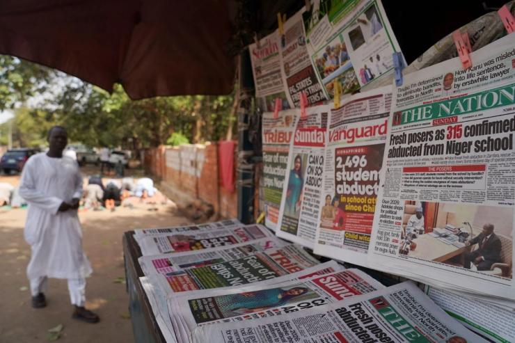 Newspapers with headlines on recent abductions at a stand in Abuja on Nov. 23, 2025.