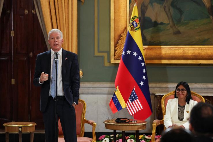 US Energy Secretary Chris Wright next to Venezuelan acting President Delcy Rodriguez.