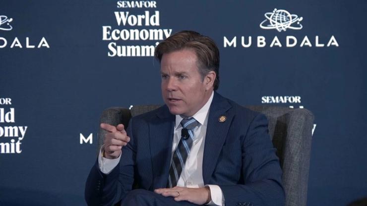 Mike Haridopolos on stage.