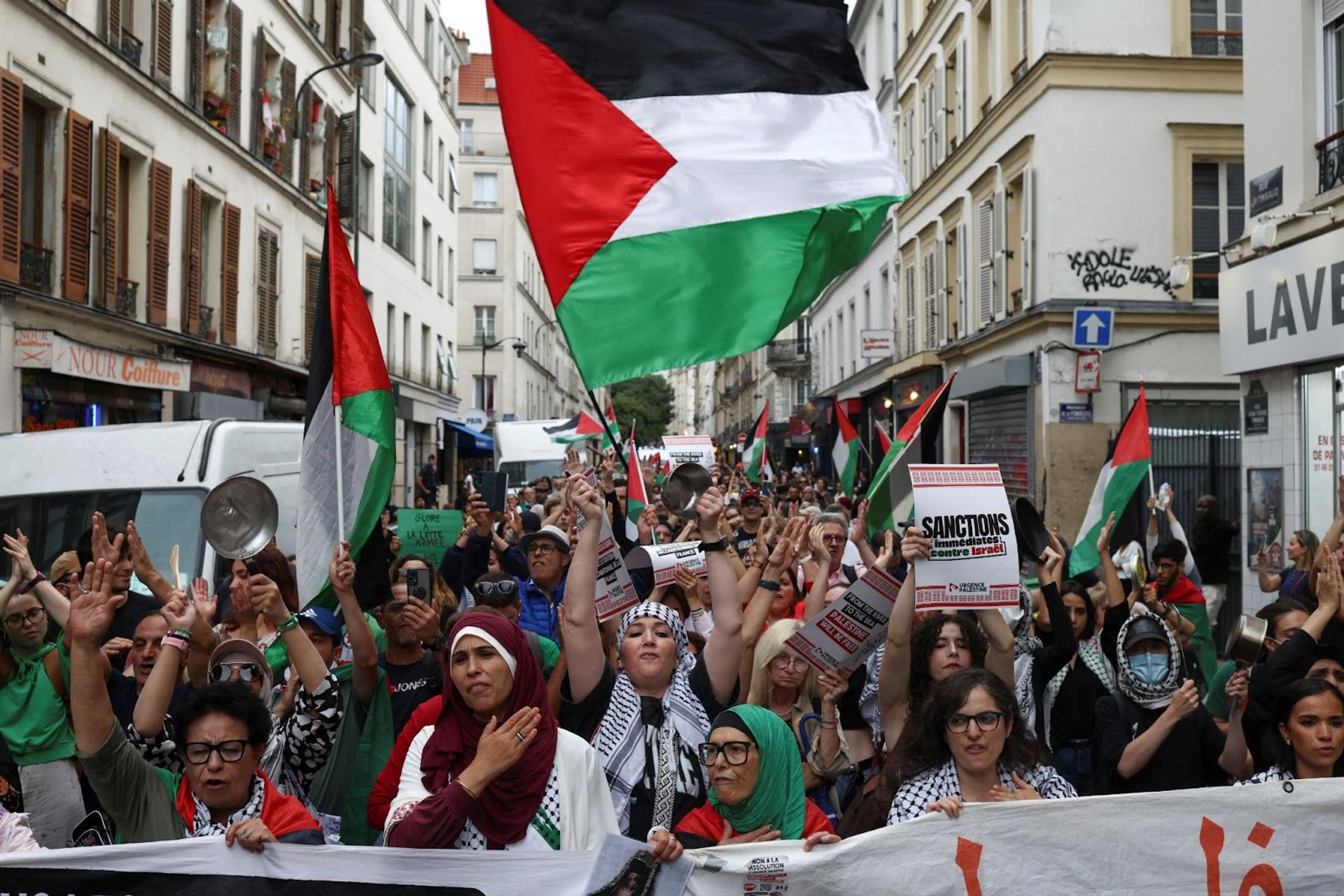 People take part in a protest in support of Palestinians in Paris. 