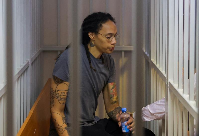 Brittney Griner sits inside a defendants’ cage after the court’s verdict in Khimki outside Moscow, Russia August 4, 2022.