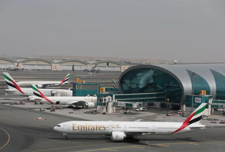 Emirates Airline planes are seen at Dubai International Airport in Dubai.