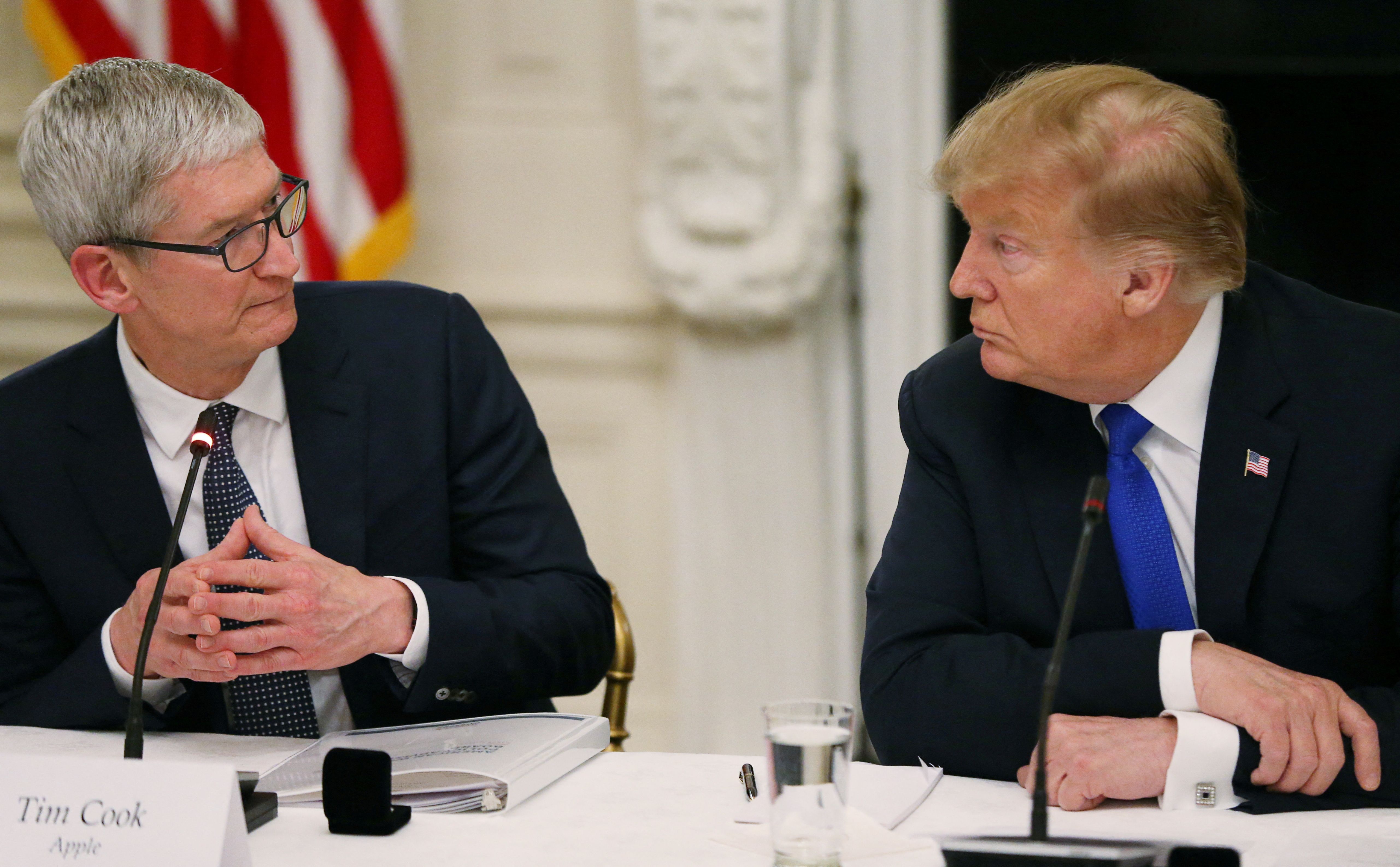 Apple CEO Tim Cook and US President Donald Trump