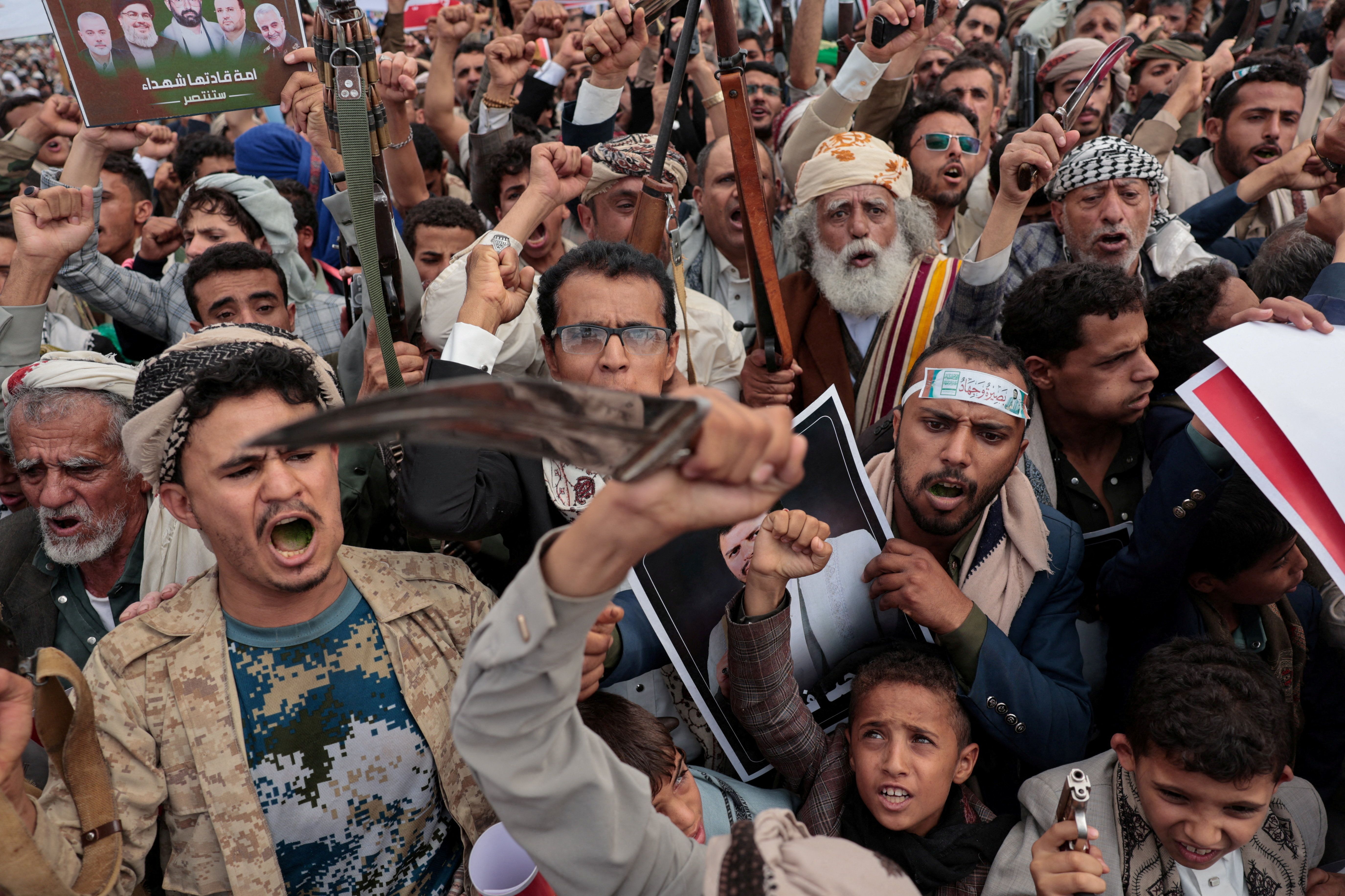 Houthi supporters rally against the Saudi-led coalition’s restrictions on Houthi-controlled areas