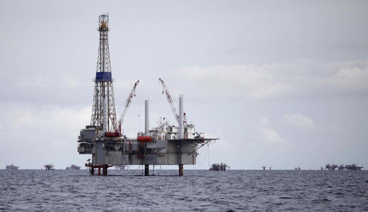 A view of a drilling rig and distant production platform in the Soldado Field off Trinidad’s southwest coast.
