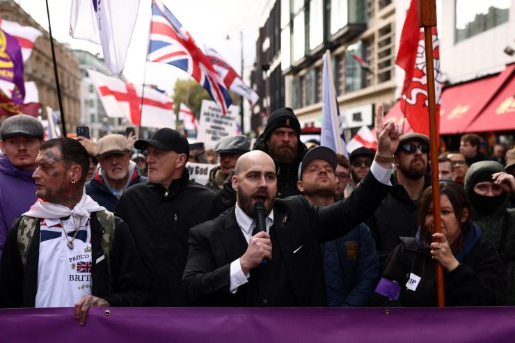 Leader of United Kingdom Independence Party (UKIP) Nick Tenconi speaks during an anti-immigration march.