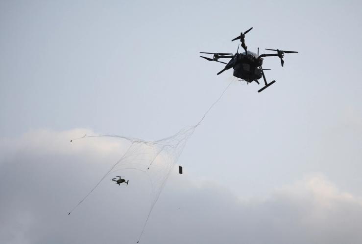 South Korea’s drones take part in an anti-terror drill to prepare against chemical and drone attacks, at Korea International Exhibition Center in Goyang, South Korea October 27, 2022.