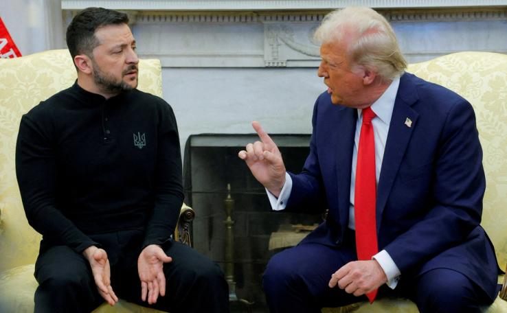 U.S. President Donald Trump talks with Ukrainian President Volodymyr Zelenskiy at the White House in Washington, D.C., U.S., February 28, 2025.
