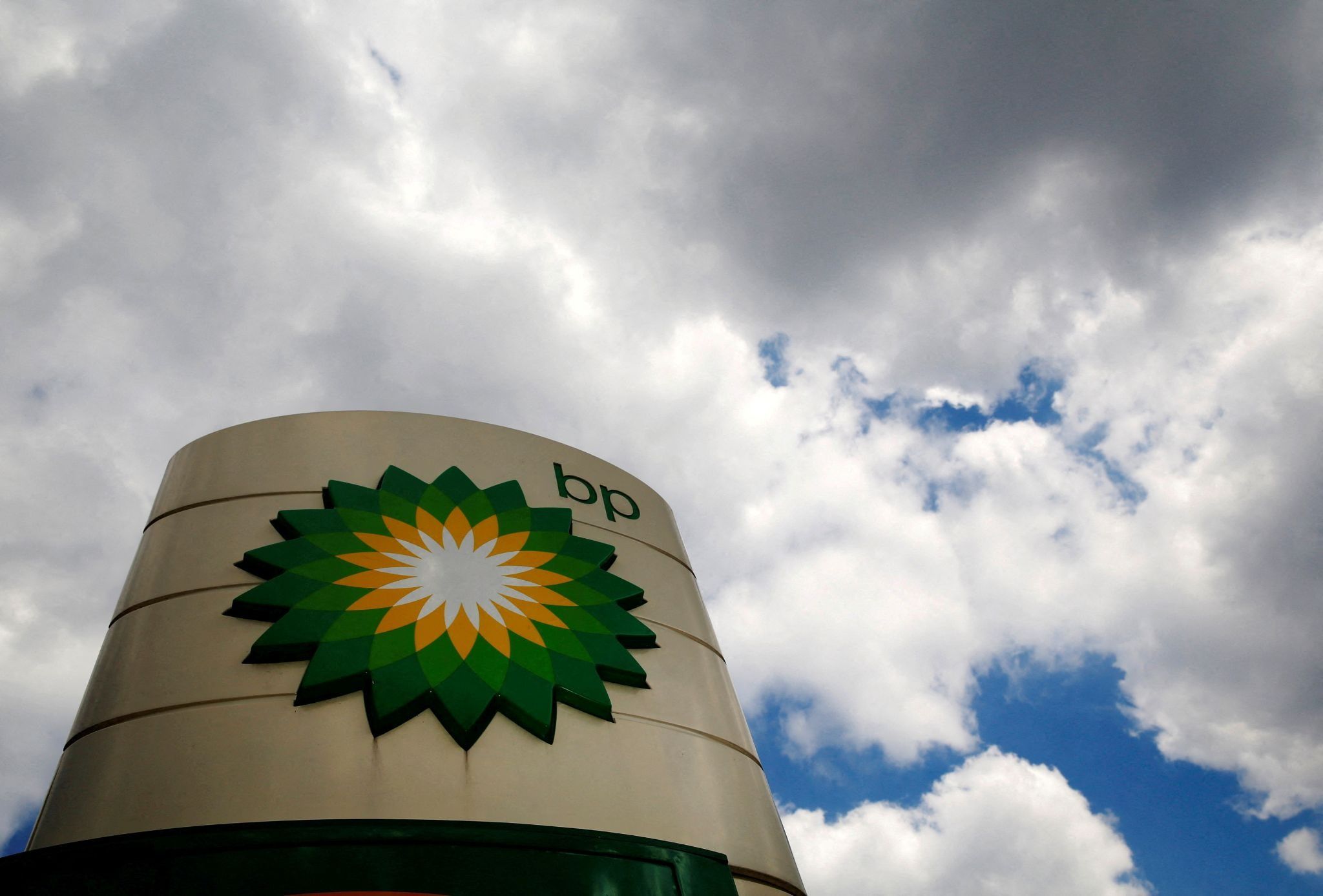 BP sign with clouds behind