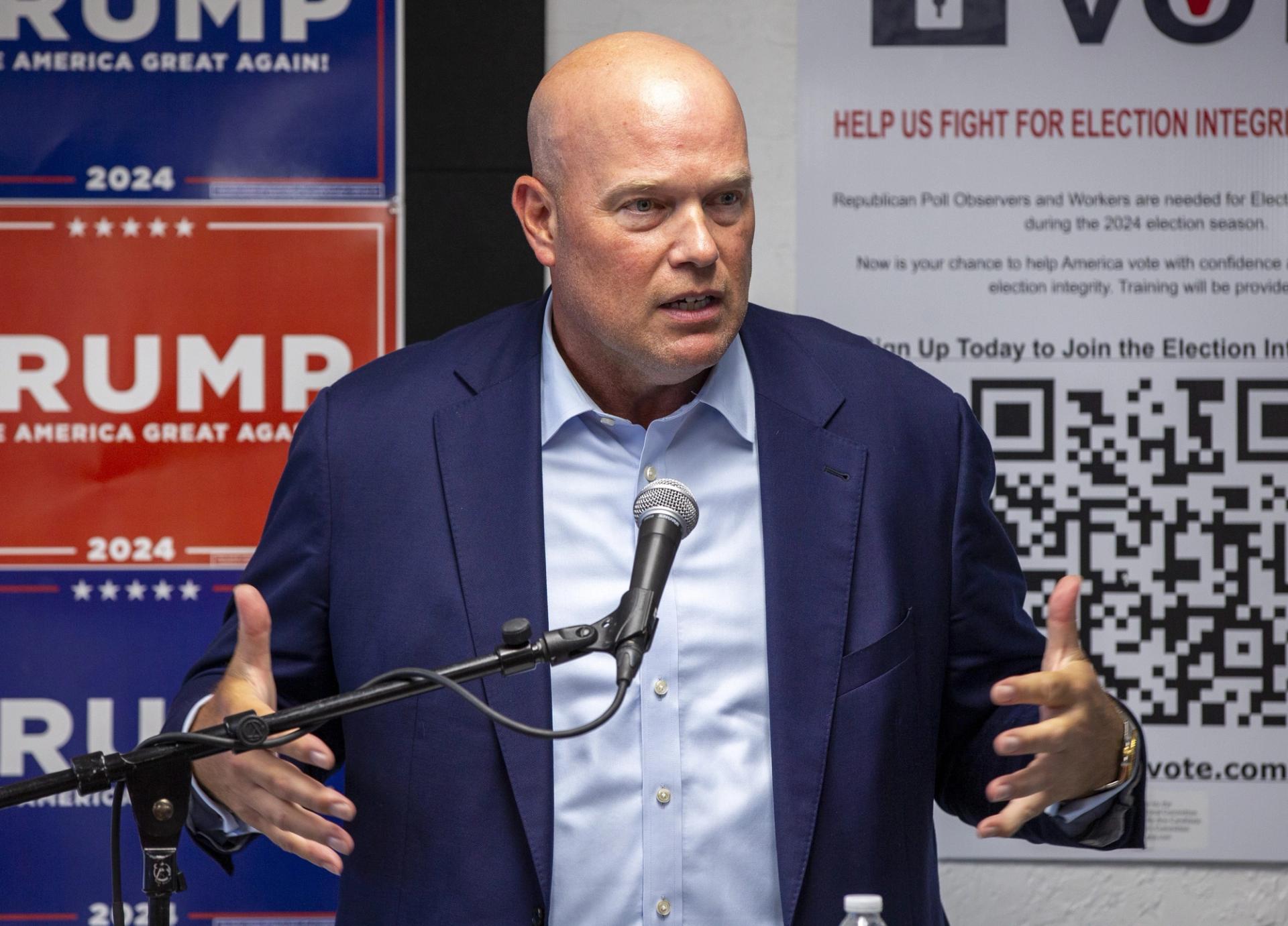 Former Acting Attorney General Matt Whitaker addresses a crowd at the opening of the new Trump Force 47 office in Casa Grande, Arizona.