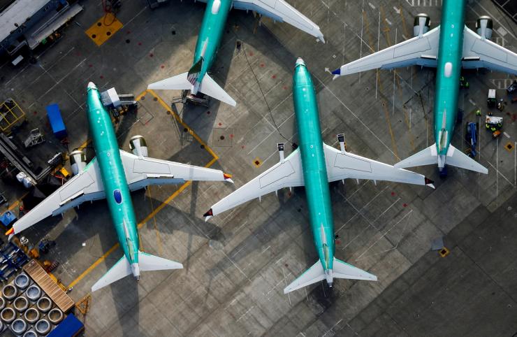 An aerial photo shows Boeing 737 MAX airplanes parked on the tarmac at the Boeing Factory in Renton, Washington, on March 21, 2019.