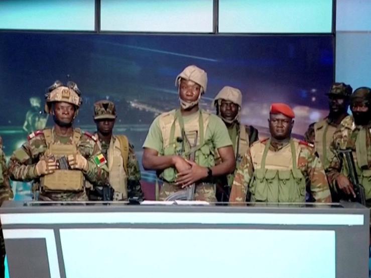A group of soldiers gives a statement on Benin’s national television, claiming to have seized power, following reports of a coup attempt underway against the government of Benin, in this screengrab from a handout video on December 7, 2025.