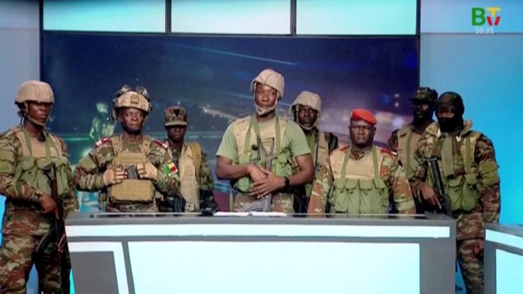A group of soldiers gives a statement on Benin’s national television, claiming to have seized power, following reports of a coup attempt underway against the government of Benin, in this screengrab from a handout video on December 7, 2025.