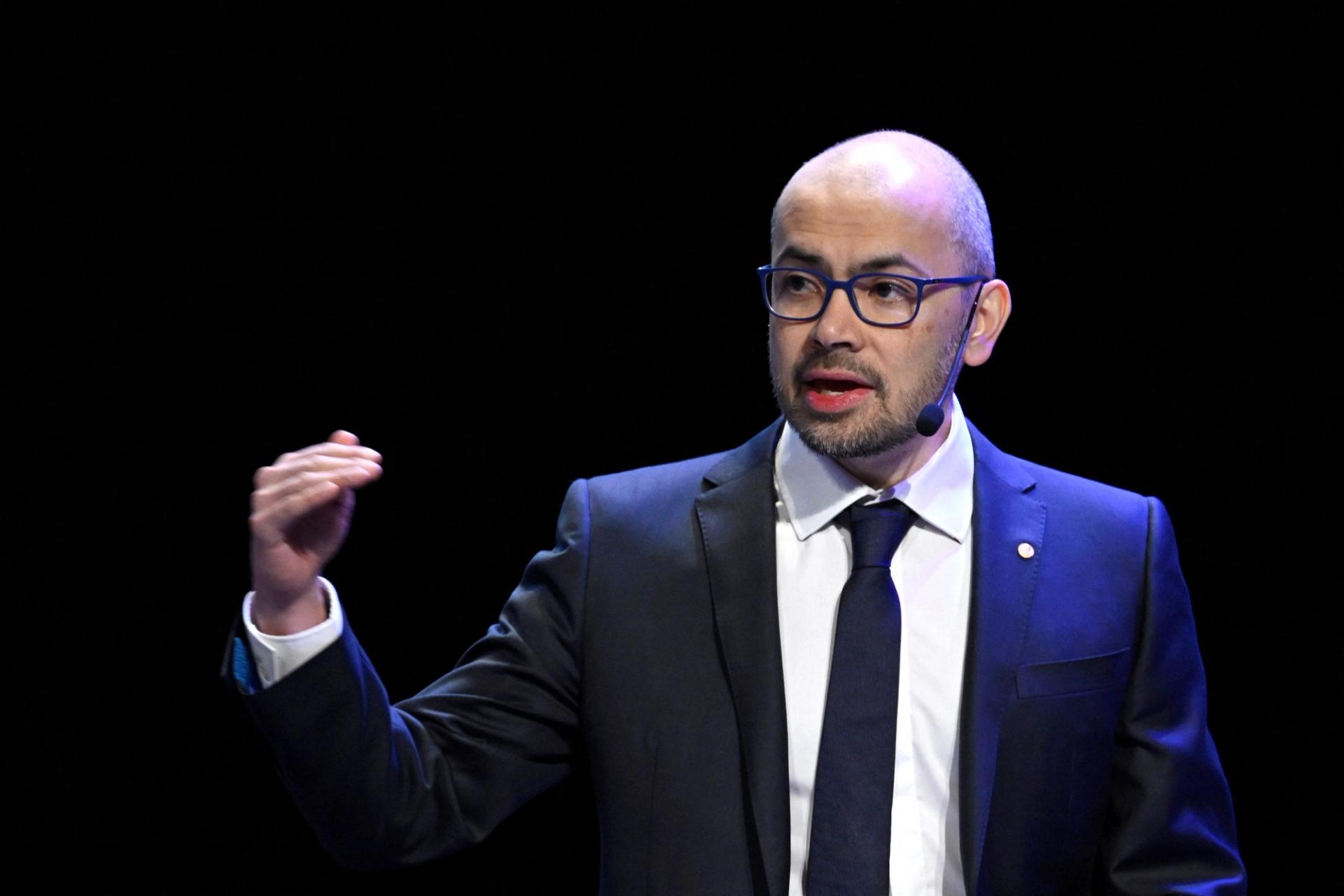 Demis Hassabis speaking during the Nobel Prize lecture in chemistry in Stockholm in December 2024.