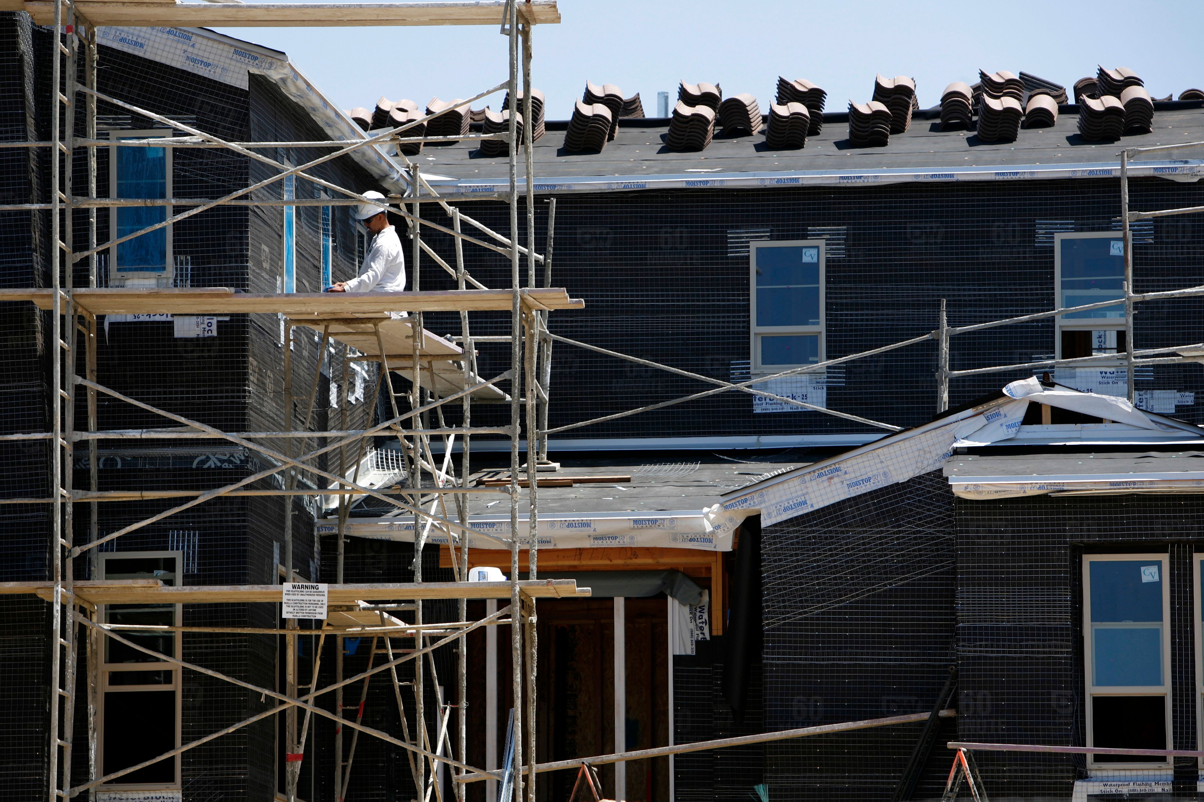 New home construction continues at a new housing subdivision in San Marcos California.