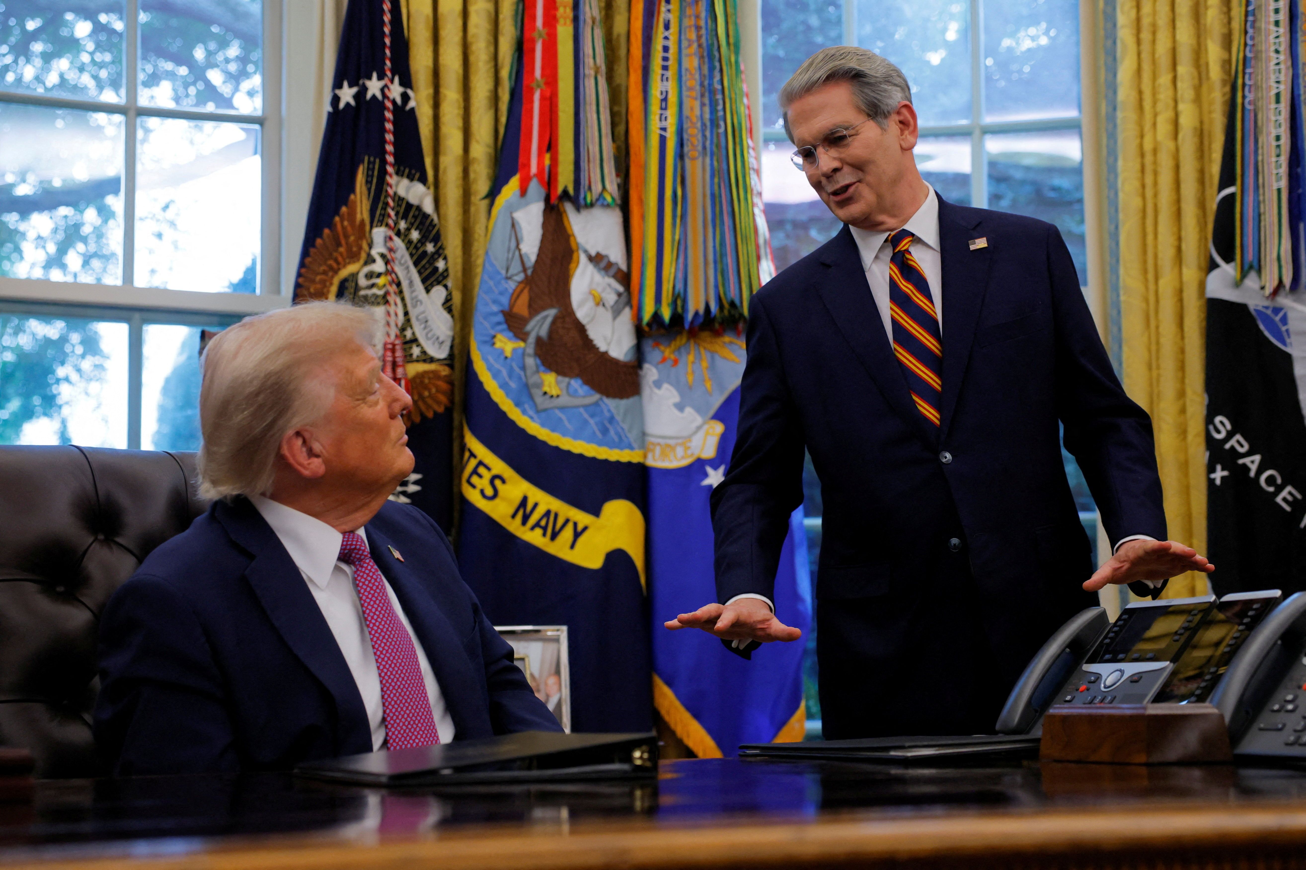 US President Donald Trump with Scott Bessent. 