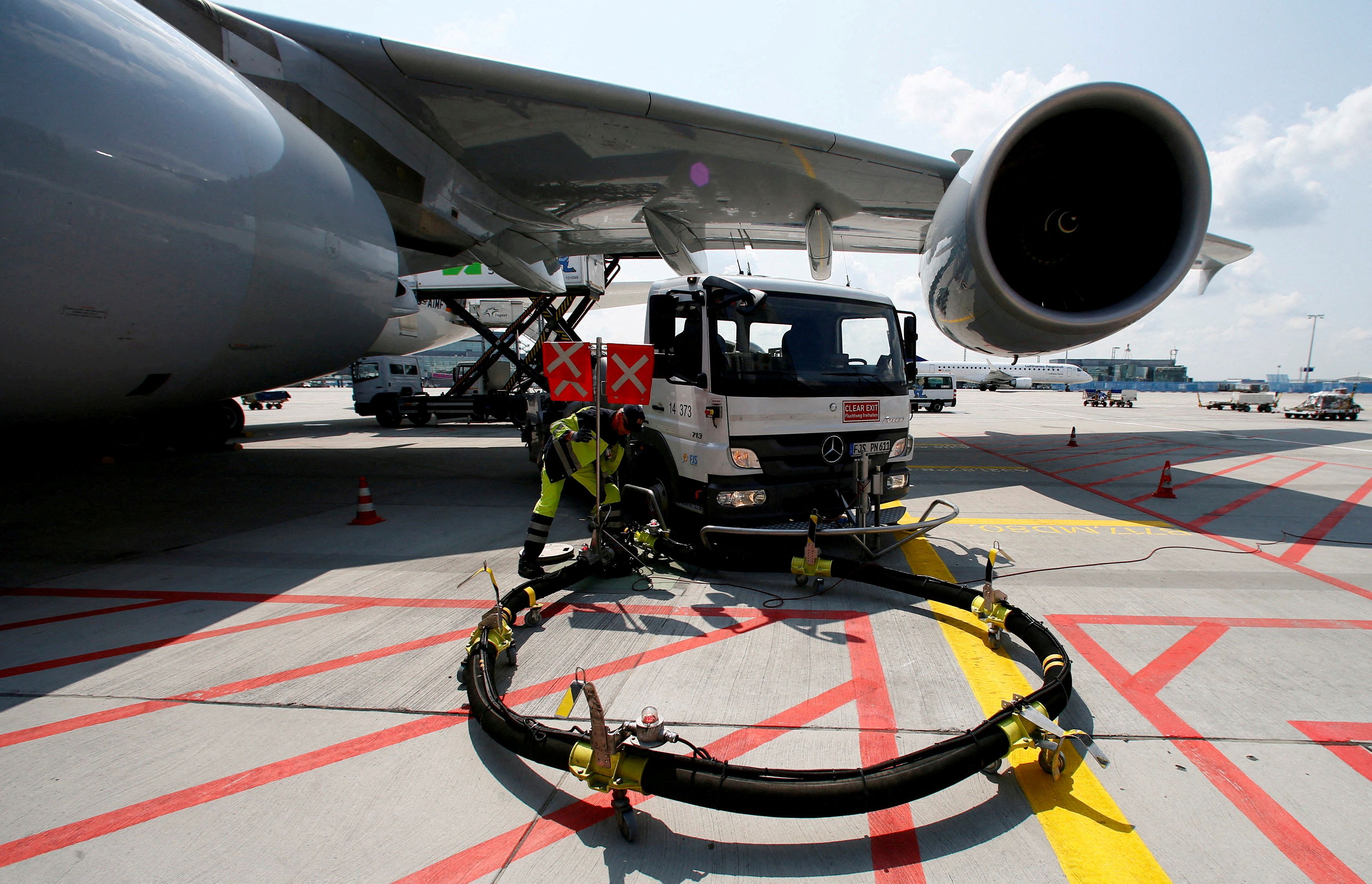 A Lufthansa Airbus 380 is refueled in Frankfurt airport.