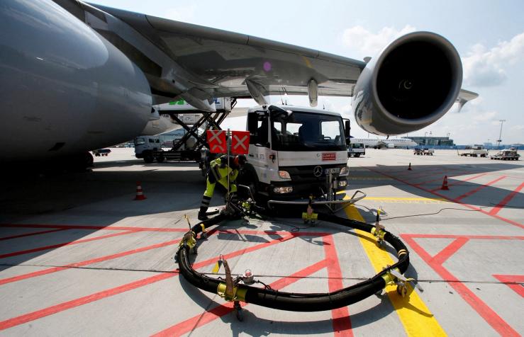 A Lufthansa Airbus 380 is refueled in Frankfurt airport.