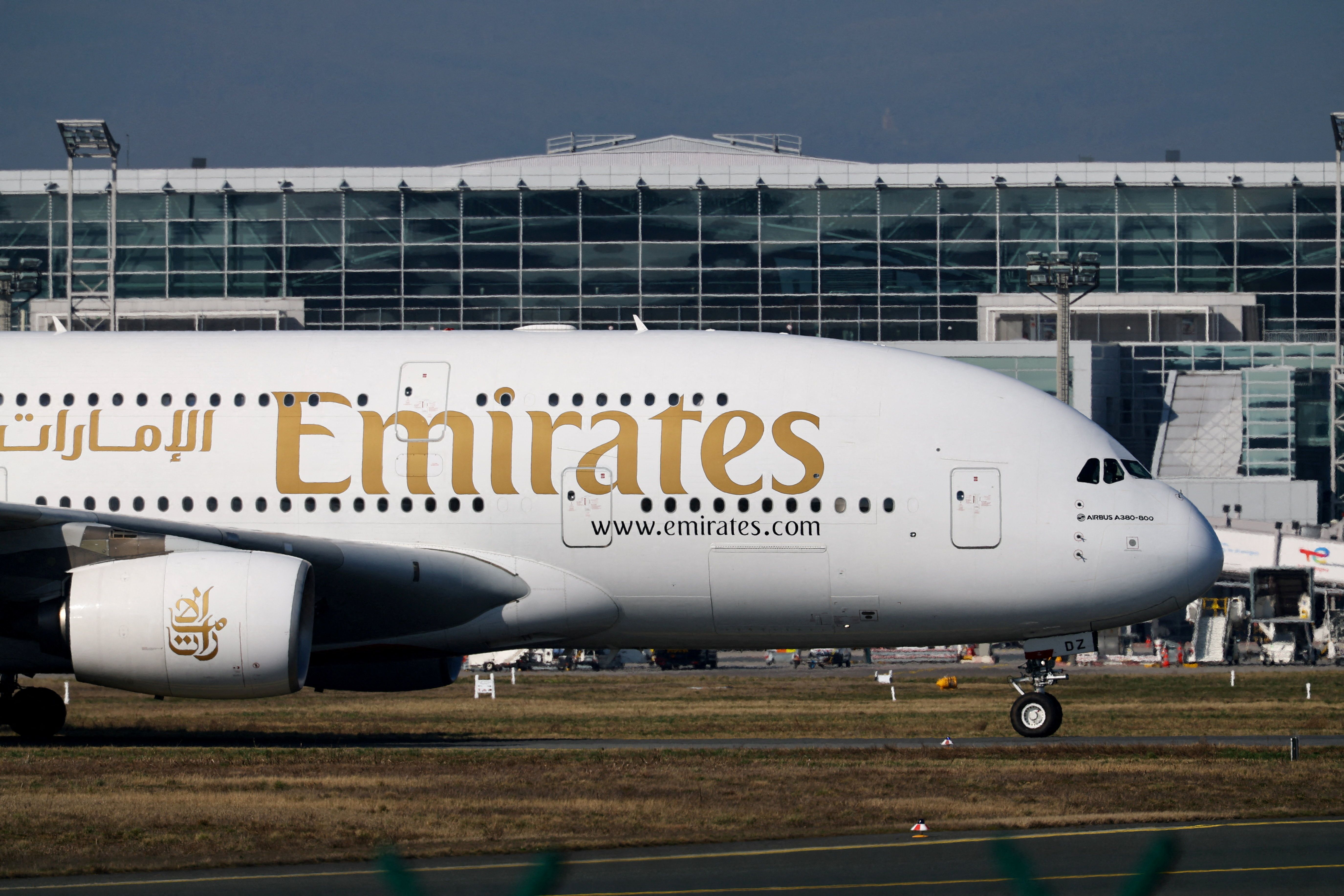 An Emirates plane with German tourists evacuated from the Middle East arrives from Dubai.