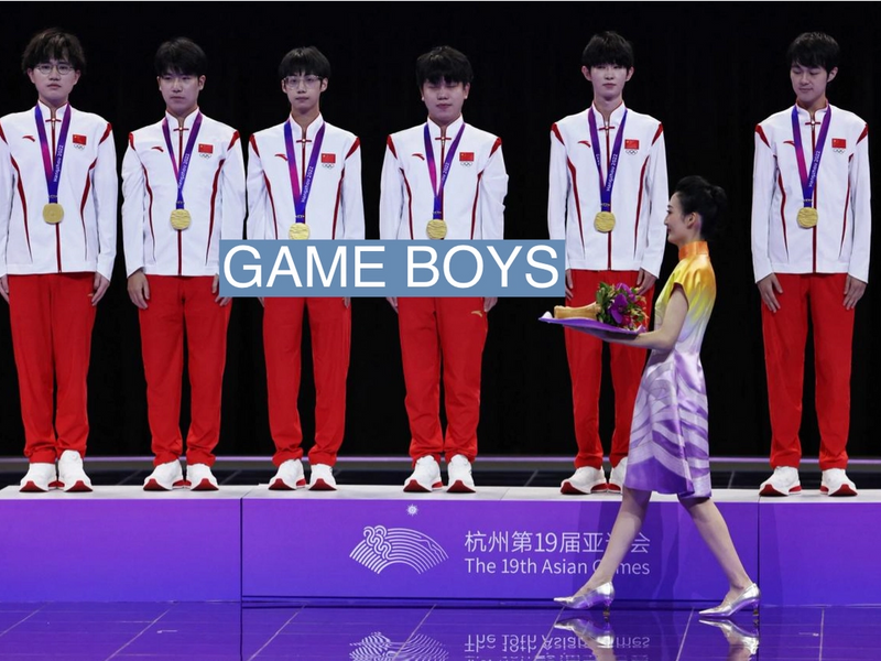 Team China with gold medals after winning the Arena of Valor game in the esposts event at the Asian Games