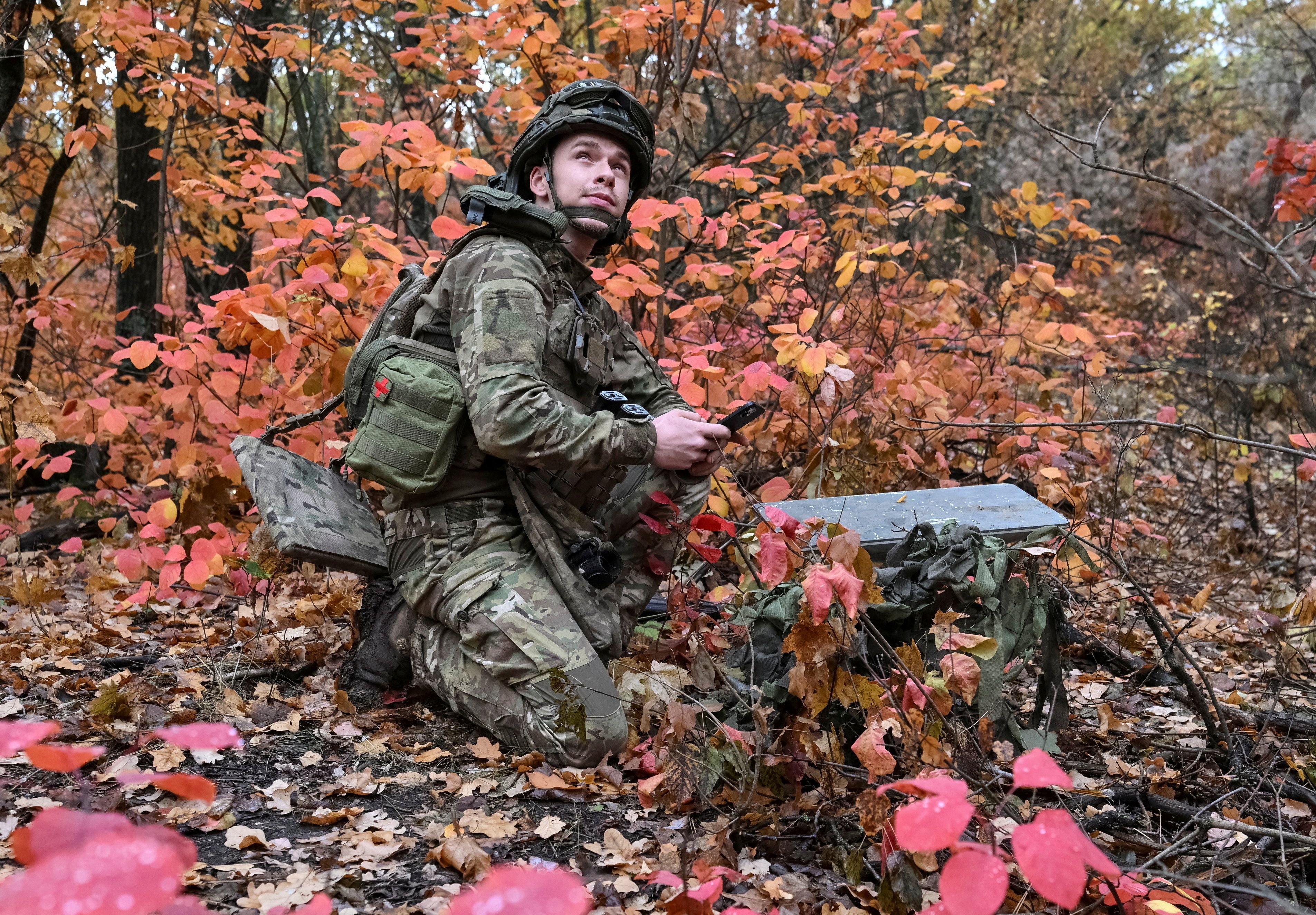 An artilleryman of the Special Rifle Police Battalion of Zaporizhzhia region sets up Starlink satellite internet system, , near the frontline in Donetsk region, Ukraine