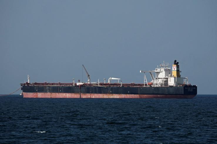 Trikwong Venture, a crude oil tanker sits anchored in Muscat.